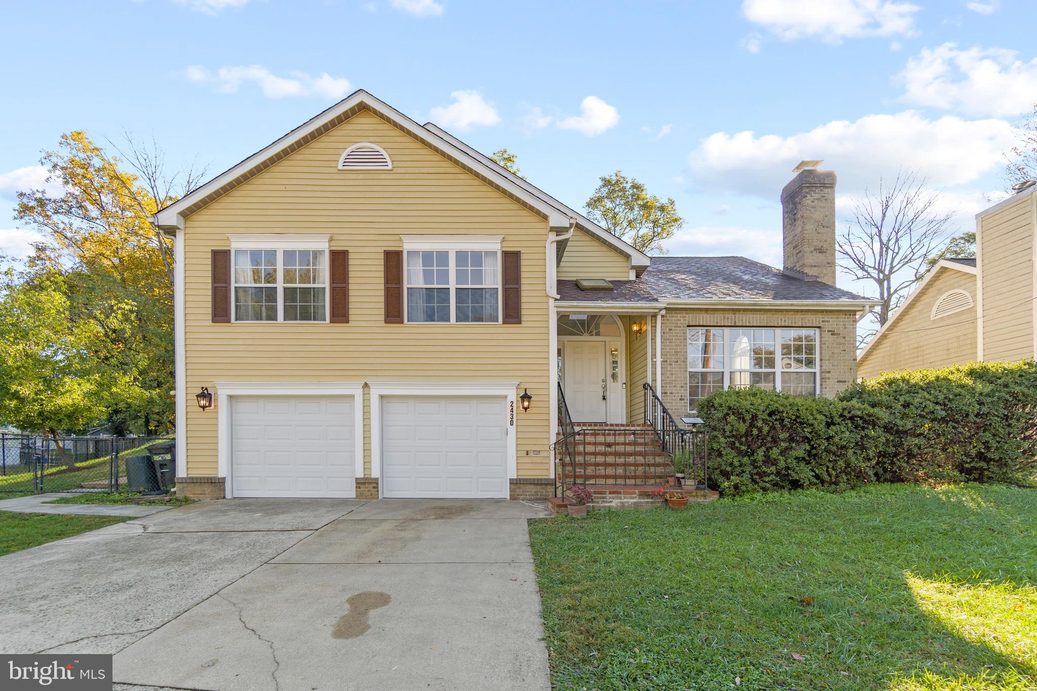 Welcome to 2430 Lyttonsville Road, a spacious 5-bedroom, 6-bath colonial in the heart of Silver Spring. The main level features beautiful hardwood floors and an updated kitchen with granite counters and stainless steel appliances. Three large bedroom suites each have a private bath and walk-in closet. Multiple living areas include a formal dining room, a living room with a fireplace, a spacious deck, and a lower-level lounge with a wet bar and full bath. A private rear extension with a separate entrance offers another wet bar, full bath, and two flexible rooms—ideal for a gym, office, or guest space. This home also offers a great opportunity for rental income or an in-law suite, thanks to its separate entrances and versatile layout. The fully fenced backyard adds to the appeal. Fantastic location: walk to the future Lyttonsville Purple Line Station and only 5 minutes from both Silver Spring and Forest Glen Metro stations. Convenient to top schools, shopping, and dining. Don’t miss this one—schedule a tour today!