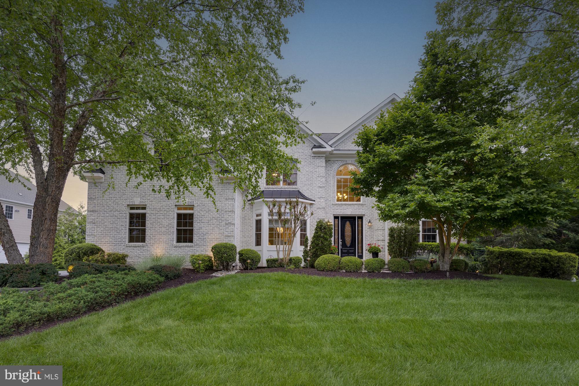 Stunning all brick home in sought after Tysons Estates with a backyard oasis sited on a private .49 acre lot.  The sun-filled interior boasts 7 bedrooms, 6.5 bathrooms, 3 car side-load garage and 7,342 finished square feet over three levels. An entertainer’s dream with a grand foyer and curved staircase, open floor plan, formal dining, and butler’s pantry. Bright chef’s kitchen with a large island and high end appliances opens to the breakfast room and gas fireplace. Inviting family room with coffered ceilings and gas fireplace. In-law suite with full bath is full of potential and could be used as a living room or second home office. Main level also boasts a home office, sunroom, and half bath. Luxury owner’s suite with a tray ceiling, dual custom walk-in closets and spa-like en suite bath. Four additional bedrooms, one with access to a private covered balcony and all with en suite access to full baths, including a Jack and Jill bath. A main level mudroom/laundry room and an upper level laundry room. Finished lower level walks-out and boasts a recreation room with surround sound, wet bar, au pair suite with full bath, and extensive wine cellar for 1000+ bottles. A true stay at home retreat with an expansive deck, patio, in-ground heated saltwater pool and fenced backyard surrounded by trees. This home has the best of everything! Amazing Vienna location close to Metro, parks, restaurants, shopping, and commuter routes. Top rated Westbriar/Kilmer/Marshall Pyramid.