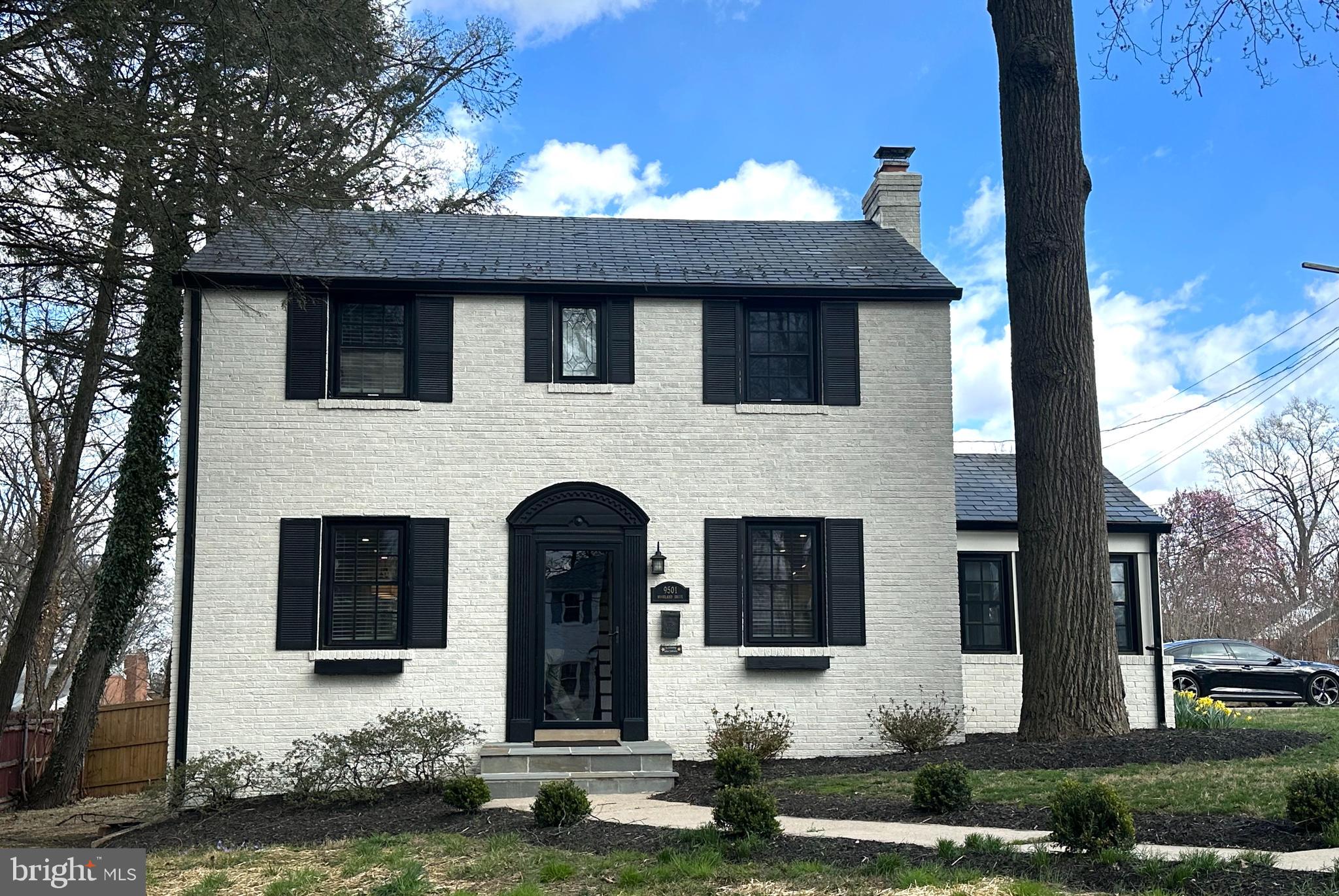 Open Sunday 2pm-4pm! Fresh landscaping, privacy trees, and a new fence make this home the luxury retreat you deserve!  This home has been beautifully updated and features a new  kitchen , a finished lower level, and off street parking. The two zone HVAC system offers modern comfort and the radiators were left to ensure the warmth you want, all winter long. A first floor office with a separate entrance makes the ability to work from home another added convenience.  The finished lower level bedroom/bathroom accompanied by a private entrance is perfect for anyone needing the space and flexibility.  To top it all off, relax and enjoy the outdoors from the privacy of your screened in porch.