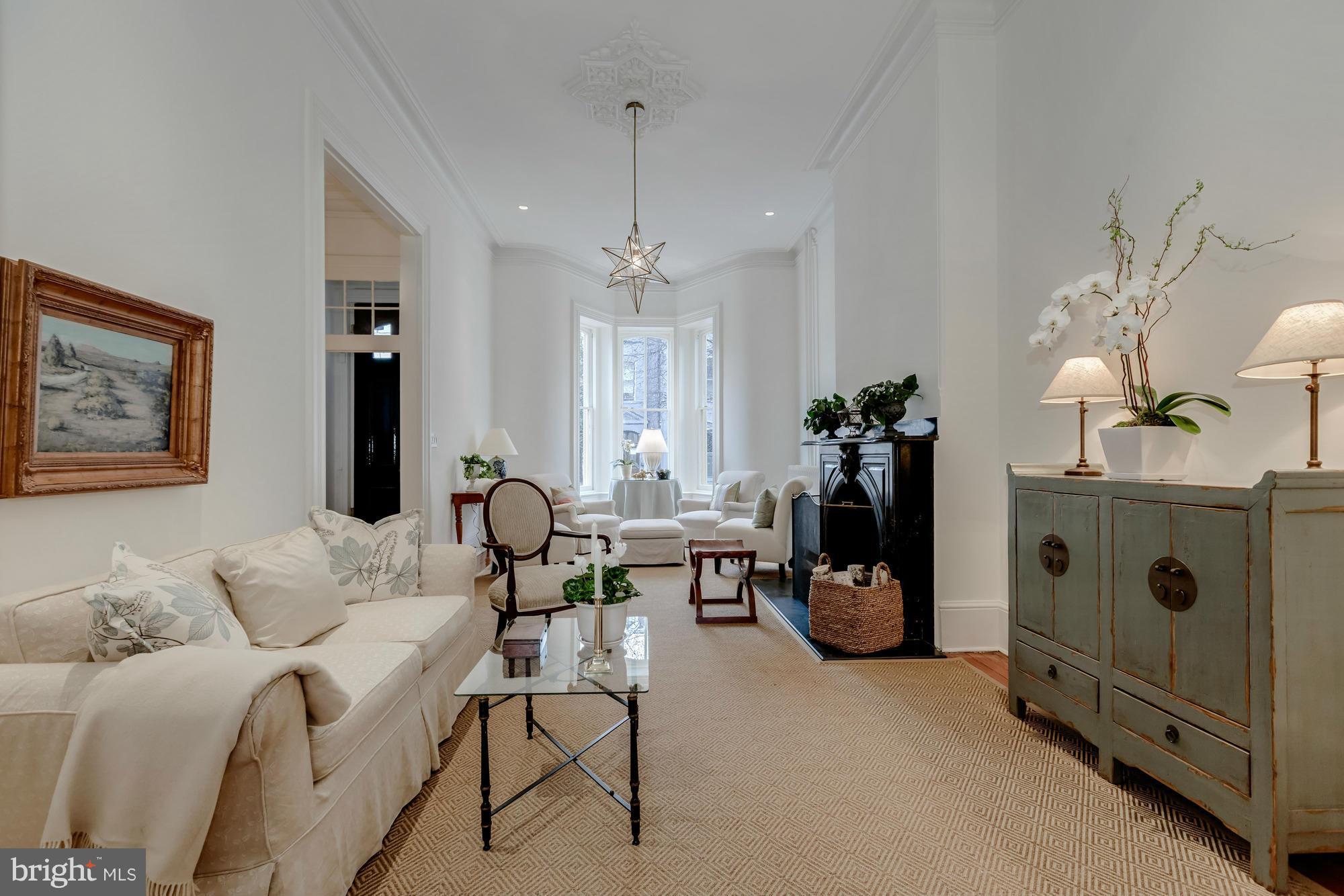 Stunning Victorian with three car parking in the East  Village.  The home has 3BR/3.5BA with a lower level in-law suite w/ 1BR/1BA and separate entrance.  Features fabulous high ceilings on all levels, spacious rooms and tons of natural light. Luxurious master suite with generous closets and beautiful en-suite bath.