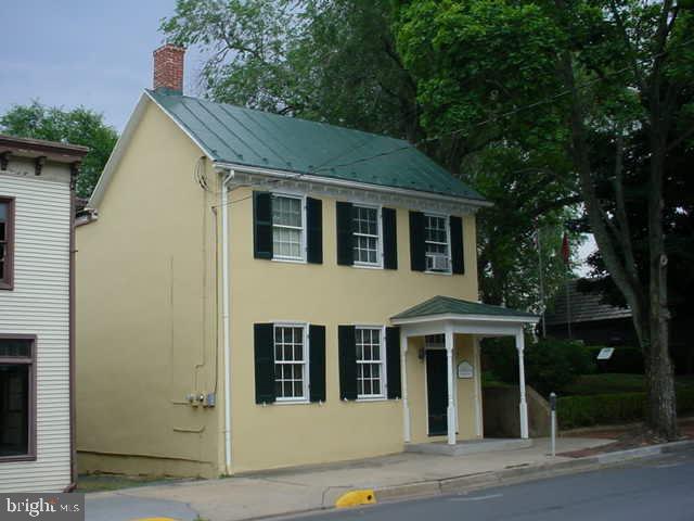 Circa 1920 office building in downtown Winchester. Currently used as a lawyer's office, but could easily be an office-and-residential space or a single-family home. Off-street parking.