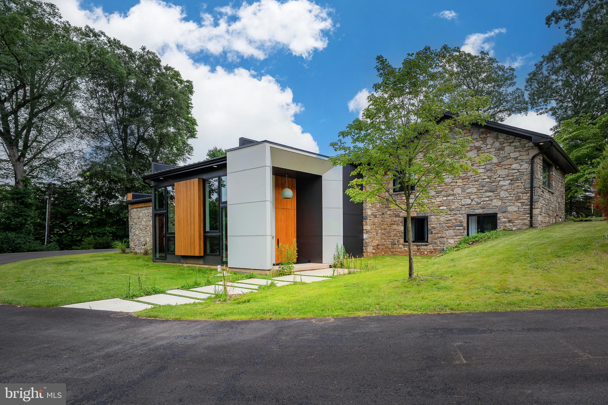 Come home just in time for the Summer! 

 An exquisite home, located on a quiet, tree-lined cul-de-sac in the highly acclaimed Garnet Valley School District, this newly designed and rebuilt residence offers a rare opportunity to own a home where thoughtful design and modern sophistication converge. 

Boasting 5 expansive bedrooms and 4.5 impeccably appointed bathrooms, every inch of this residence exudes elegance and comfort. Main level bedroom suite with walk-in closet, full bath and dedicated living space offers an ideal retreat for you, in-laws, senior family member, or an au pair. 

At the heart of the home is a truly exceptional chef's kitchen, anchored by a professional-grade gas range and outfitted with top-of-the-line appliances, wet-bar  and bespoke finishes. The gourmet kitchen features an expansive quartz waterfall island, dual toned custom cabinetry–ideal for even the most discerning chef. 
The open-concept living and dining areas are perfectly suited for both intimate family gatherings as well as grand-scale entertaining. 

The primary bedroom suite with a huge attached walk-in closet and bath, is its own relaxing oasis. The primary bath includes a spa-like atmosphere with a rain-shower, soak-in tub, dual vanities and a clean contemporary design. 

Designed for effortless living, this home is equipped with private propane tank, dual-fuel heating, multi-zone central air conditioning, fragrance diffuser, water softener system, and a whole-house generator ensuring comfort and peace of mind in every season. 
Pre-wired, inside and out, for all your tech needs with commercial grade WiFi, audio, Alexa enabled LED lighting, smart switches, and thermostats. 
The property is also prepared with utilities for a future swimming pool, should you choose. 
There is an attached 2-car garage with inside access equipped with smart door openers and EV hookups already in place.

A rare offering in one of the area's most coveted neighborhoods, this home is an exceptional opportunity for the most discerning homeowner. 

Minutes to shopping, most major highways and approx. 25 minutes to Philadelphia International airport, 30 minutes to Center City Philadelphia, 15 minutes to Wilmington DE and just about 2 hours to NYC and DC.  

Don't miss the opportunity to make this rare find - the place you call home!

Available for immediate occupancy. Private showings for prequalified buyers- by appointment only.