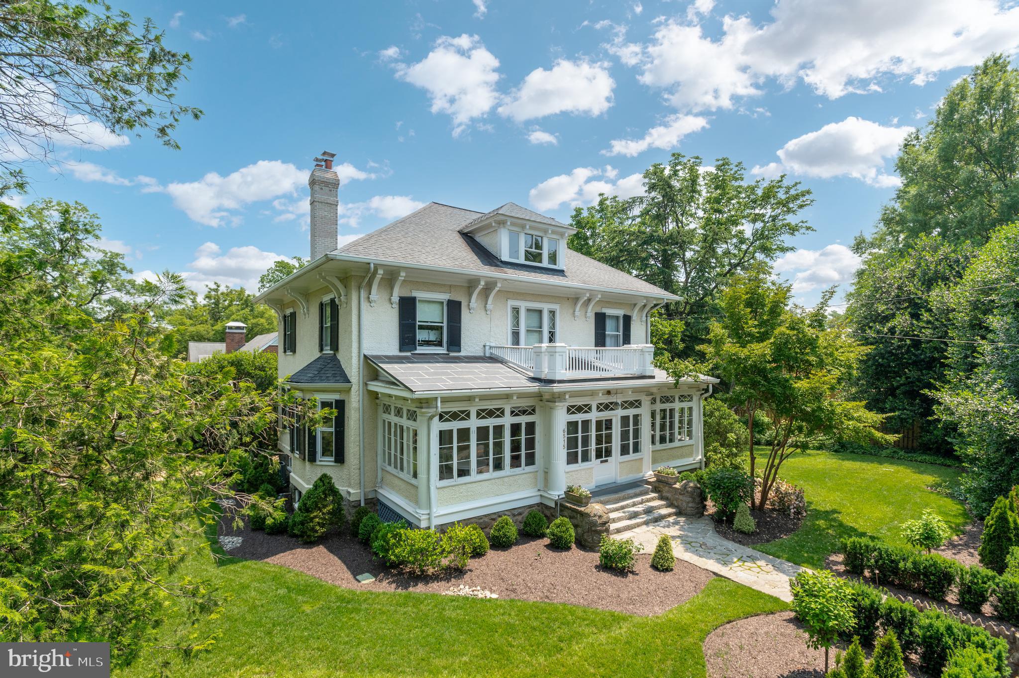 Open House on 10/12 is canceled! 

Step into the Theodore Sonnemann Sr. House, a distinguished 1906 residence that gracefully blends historic character with modern updates throughout. Set on over a third of an acre of manicured gardens and expansive yard space, the property enjoys a rare sense of serenity, seamlessly extending into the verdant landscape of the adjacent park.

Inside, exquisite architectural details reveal themselves at every turn—soaring 9.5-foot ceilings, elegant pocket doors, and finely crafted millwork. The main level unfolds with a welcoming enclosed porch, a grand foyer, and an expansive formal dining room framed by bay windows and intricate dental molding. A gracious living room, intimate family room anchored by a wood-burning fireplace, full bath, and mudroom with direct driveway access ensure both elegance and ease of daily living. At the heart of the home, the gourmet kitchen dazzles with a marble-topped center island, high-end stainless steel appliances, and abundant custom cabinetry.

The second floor is home to four well-proportioned bedrooms and two full baths, including the primary suite with an ensuite bath and a connecting fourth bedroom—ideal as a nursery, dressing room, private study, or an additional guest bedroom. The third floor offers an additional spacious bedroom and exciting potential for future expansion, while the unfinished lower level provides generous storage and laundry facilities.

Nestled within the Village of Martin’s Additions, this home captures the essence of small-town charm with cosmopolitan access. Just blocks away, neighborhood favorites like Brookville Market, Olympia Café, and Le Ferme Restaurant create a lively village center. Seasonal farmers markets, weekend food trucks, and cherished traditions—from Fourth of July parades to Halloween festivities—foster a strong sense of community. All this, within easy reach of downtown Bethesda, Washington, DC, and the Capital Beltway, makes the Theodore Sonnemann Sr. House a rare offering of timeless grace in one of Chevy Chase’s most beloved enclaves.