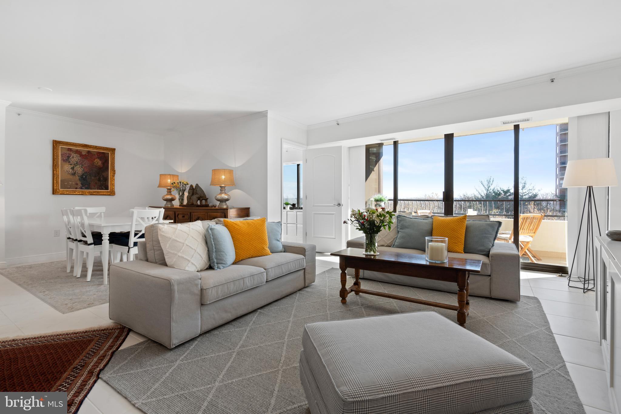 MUST SEE in person to fully appreciate this absolutely stunning 3 bed/2 bath luxury condo at Crystal Gateway with Potomac River and DC views and natural light galore! With over $125,000 in upgrades, there is nothing left for you to do other than move in and enjoy. The entire unit was thoughtfully renovated in 2016 with modern, elegant accents throughout including arched doorways, crown molding, smoothed ceilings and beautiful low maintenance tile floors. HVAC is brand new in 2024. Light and bright kitchen with loads of hidden storage, huge double-door pantry and full size washer and dryer. Oversized balcony with access from the living room, primary and secondary bedroom overlooks the Potomac River and park - perfect for entertaining! Comes with 1 deeded garage parking space and extra storage. Primary suite is generously sized with walk in closet, secondary closet and an ensuite bathroom that was beautifully designed with function in mind - to include an oversized shower, double vanity, and separate water closet (that also doubles as a hallway powder room). The two secondary bedrooms also do not disappoint with lots of natural light. One of the bedrooms is currently used as a great home office, but can easily be configured as a third bedroom. Hallway bathroom includes a large vanity and a bathtub. Building is extremely well managed, with full 24/7 concierge service, underground tunnel to Metro and shopping, indoor and outdoor pools, gym, library, party room, in-house maintenance program. Pets are not allowed, but service animals are welcome. Condo fees include water and trash removal. Easy access to major commuter routes—I395, I66, Route 1. Visit close-by Whole Foods, eateries, theaters and shopping at Pentagon City Mall, Pentagon Row, Costco, Potomac Yard, National Landing. Minutes from National Airport, Pentagon, DC.