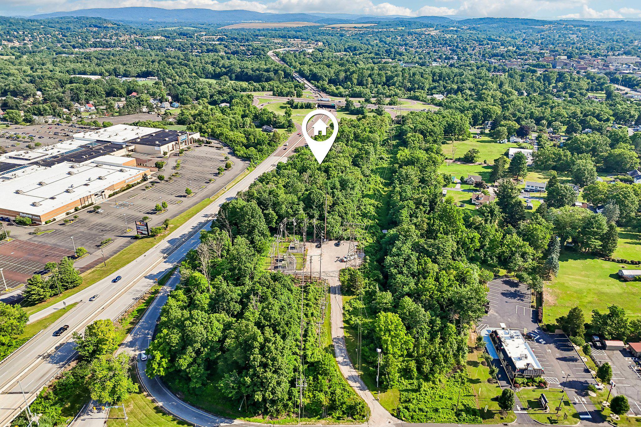 Exceptional 16.73-acre development opportunity in the heart of rapidly growing North Coventry Township. Ideally positioned at the prominent intersection of Route 100 and Route 724, this strategically located property offers outstanding frontage, excellent accessibility, and exceptional visibility. Public water and public sewer are available.

Situated within the TC-1 Town Center District with the Highway Interchange Overlay, the site presents a unique opportunity for a variety of potential commercial, retail, mixed-use, or residential uses, subject to township approvals. The property consists of six included tax parcels, and previous site engineering studies are available to the buyer.

Surrounded by established retail, residential, and commercial development, and located just minutes from Route 422, this highly desirable corner location is well positioned to benefit from the continued growth of the area. The owner is open to creative purchase structures and partnership opportunities.

Whether you’re a developer, investor, or end user, this is a rare opportunity to acquire one of the last large, high-visibility development sites in northern Chester County. Buyer is responsible for conducting their own due diligence regarding zoning, permitted uses, and development approvals.