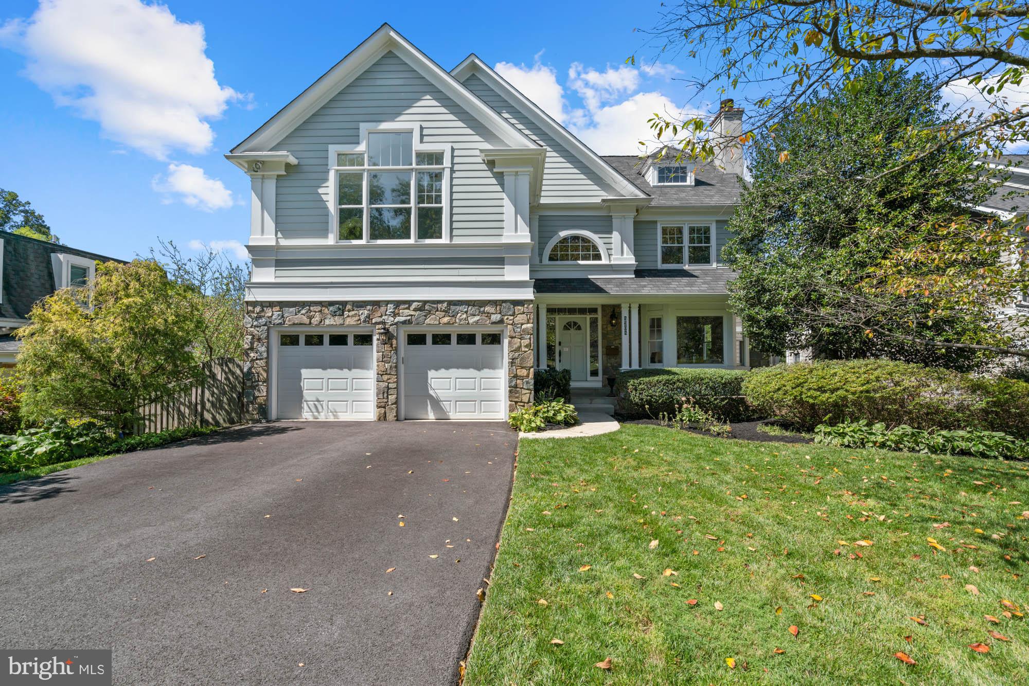 Prominently sited on a sprawling lot in the heart of the Glen Echo Heights community, this distinctive home, crafted by Sandy Spring Builders , features 3,964+/- square feet of living space. With five large bedrooms, four-and-one-half baths, and an attached two-car garage, it’s the perfectly-sized home on a premium 14,000+/- square feet lot ready for sports court, pool, or any other dreamy entertainment space.

Boasting excellent flow with generous room sizes and finer details, including oversized windows, crown moldings, and hardwood floors. Approached by a flagstone walkway and covered front porch, step into the foyer with high ceilings and an air of elegance. This home enjoys sun-drenched formal living and dining rooms boasting fireplaces, home office with built-in bookshelves, convenient powder room, kitchen open to the family room and an eat-in breakfast nook overlooking the back oversized deck with a new retractable awning and backyard. The kitchen, recently refreshed with white paint and stainless steel appliances, is a culinary asset for all types of entertaining, while the deck provides a serene spot for alfresco dining and relaxation.

The second level features four bedrooms and three full bathrooms. Retreat into the primary suite, adorned with two walk-in closets and an updated en-suite bathroom with dual vanities and a separate soaking tub, offers a private deck overlooking the backyard. The walkout basement, equipped with an exercise room, a recreation room, guest suite, kitchenette, and separate laundry, provides versatile living options for guests or extended family members.

Outside, the ample private backyard space presents an opportunity for a future pool, perfect for creating your own oasis. Don't miss the opportunity to make this exceptional property your own, offering a harmonious blend of comfort and style.

5308 Wehawken Road is just a short stroll to the natural beauty of the Potomac River, as well as the arts and culture of Glen Echo Park. Conveniently located near downtown Bethesda, Friendship Heights, NW D.C. and major commuting routes, this property is a supreme location close to everything while providing a secluded retreat. There is also the Glen Echo Heights Neighborhood Park featuring a playground, basketball court, and a multi-use field nearby. Whitman, Pyle, Wood Acres schools serve the neighborhood. Welcome home!