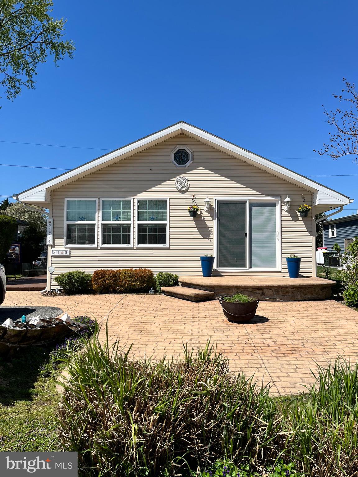 Presenting a fun, beachy home in the desirable, pristine Rehoboth Bay MHP community. This property is ideal for buyers seeking affordable beach living with high-quality finishes and zero maintenance headaches. The flowing floor plan includes three large bedrooms and two full bathrooms, one being in the primary, offering plenty of space for family and guests. Heated floors in the primary bath and whirlpool tubs in both baths. The step down family room provides a comfortable feel. Kayak and the golf cart are included, as well. The community provides excellent lifestyle appeal with amenities like playgrounds, community pool and private bay beach. Sports enthusiasts will enjoy the pickleball and tennis courts. Boaters, your paradise awaits: utilize the convenient on-site marina and private boat ramp for seamless access to the water. Whether you're looking for a vacation home or a permanent move to the Delaware coast, this home is move-in ready and waiting for you. Schedule your private tour today!