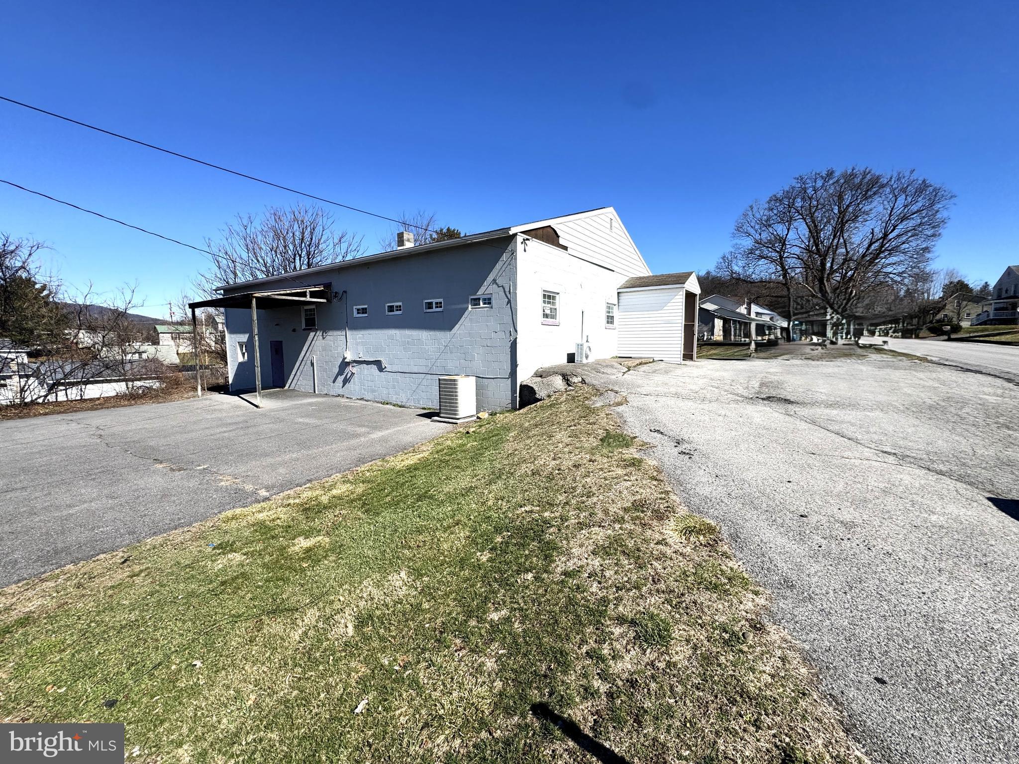 This one is a great opportunity for our community and I am Lucky to be apart of it. This building is the Original home to our Mifflin/Juniata County Special Needs & now Compass Community Connections. It has deep roots of helping the community through lots of challenges and ongoing changes. 
The building has a multitude of opportunities and key features to allow for many uses. It is a 2 level with a basement. The upper level has a large open floor plan with 2 half bathrooms, & 2 office spaces. The lower level features a large kitchen with lots of counter top & cabinet space, also a large open space for many different uses, along with 2 half bathrooms, a door to the parking lot, & a door to the back yard. The basement has tons of storage space, the furnace and electrical. The property consists of 0.55 acre, 2 parking lots, a grass back yard with walking path and pavilion. 
If you are looking for a commercial space for your business or want a place to expand to, or want to configure this into a home or apartment building, it has the potential for any of these things.