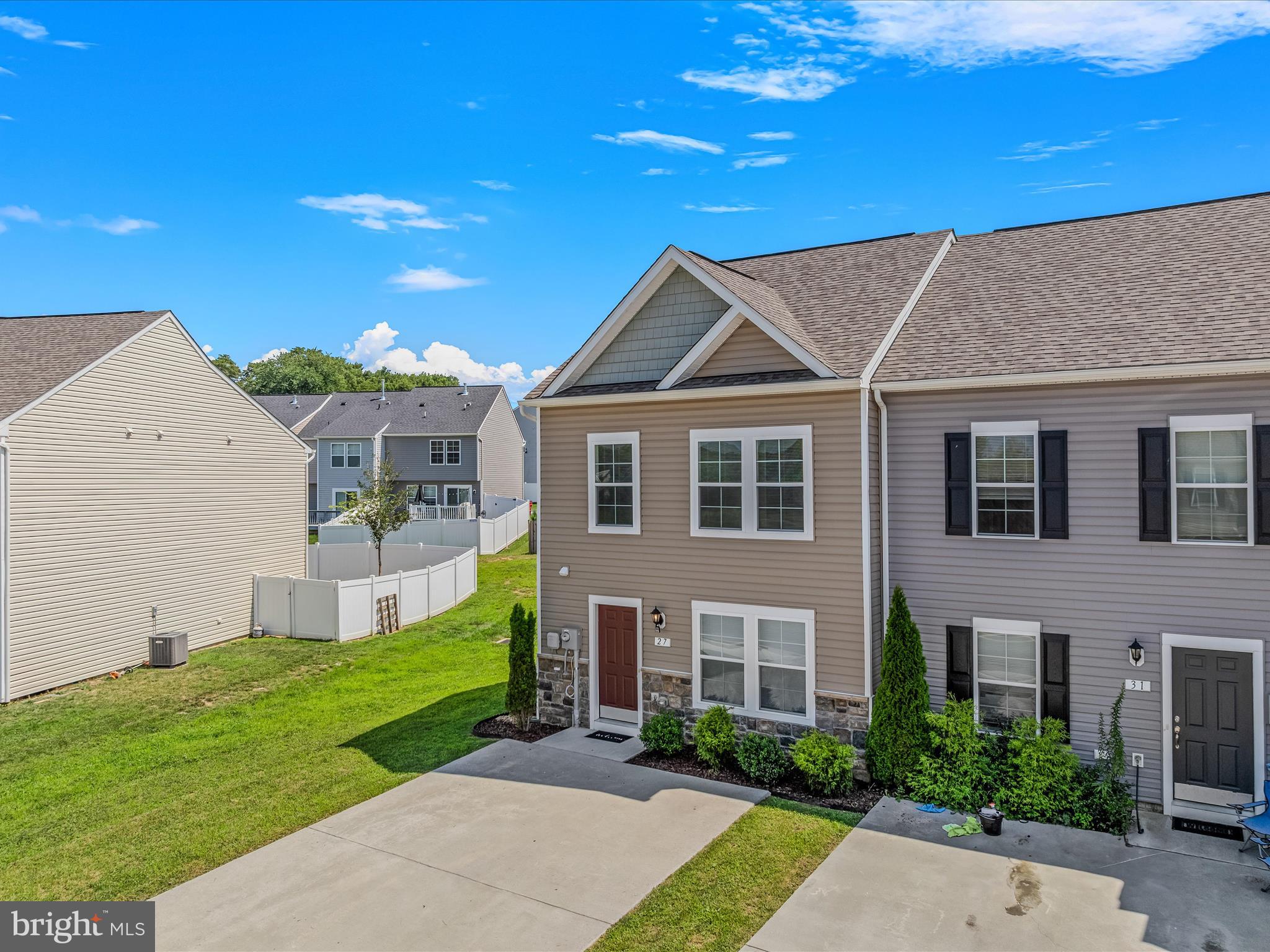 Welcome to 27 Mengel Road, a beautifully maintained end-unit townhome featuring 3 bedrooms, 2.5 bathrooms, and a thoughtfully designed layout perfect for modern living. Conveniently located just minutes from I-81, shopping, dining, and everyday essentials, this home offers both comfort and prime accessibility. Step inside to a bright, semi-open main level with luxury vinyl plank flooring throughout. The upgraded kitchen showcases quartz countertops, a center island, and stainless-steel appliances. Off the kitchen, enjoy casual meals in the breakfast nook, which opens into an extended morning room, adding valuable living space and natural light. This desirable morning room extension continues to the upper level, creating a larger footprint for the upstairs primary bedroom as well. Upstairs, you’ll find a spacious primary suite with a walk-in closet and private en suite bath. Two additional bedrooms share a full hall bathroom, and the laundry is conveniently located on the same level for added functionality. Tucked into a gas community with low-maintenance living, this end-unit townhome is the perfect blend of style, space, and location. Schedule your showing today and experience all that 27 Mengel Road has to offer!