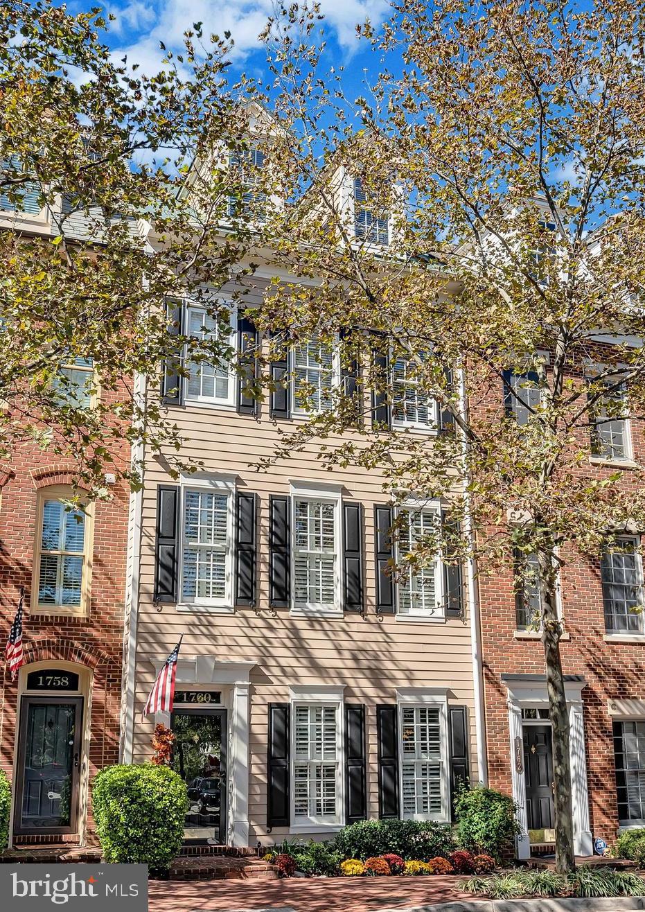 An exquisitely maintained townhome in the highly coveted Potomac Greens community, this residence seamlessly blends timeless elegance, comfort, and functionality. Designed with classic architectural details and a traditional color palette, the home features a welcoming entry-level study, a private kitchen with a dedicated grill deck, and an open-concept main living area adorned with rich hardwood floors and a gas fireplace.

The home offers three generously proportioned bedrooms, each with its own bath. The luxurious master suite is a serene retreat, highlighted by a charming bay window, a spacious walk-in closet, and a spa-inspired bath with a separate soaking tub and shower. The upper-level loft extends to a private rooftop terrace, an ideal setting for relaxation or entertaining.

Flooded with natural light, the home is further enhanced by new double-pane windows at the rear, ensuring both energy efficiency and tranquility. Recent upgrades include a brand-new upper-level HVAC system, a new water heater, a newly installed grill deck door, and two new front-facing dormer windows. The two-car garage is thoughtfully outfitted with shelving and storage racks for added convenience.

Perfectly positioned near Amazon HQ2, the Virginia Tech Innovation Campus, and the Potomac Yard Metro, this home enjoys unparalleled access to premier destinations. The Potomac Greens community offers an array of upscale amenities, including scenic nature trails, brick-paved sidewalks, a refined clubhouse with a meeting and event space, a well-equipped fitness center, a heated outdoor pool, picturesque pocket parks, and tot lots.

Beyond the community, the home’s location is simply unmatched. Minutes from Old Town Alexandria’s historic waterfront and the vibrant Del Ray neighborhood, residents can easily access the George Washington Parkway and the renowned Mount Vernon bike trail for outdoor recreation. With effortless connectivity to I-495, I-395, and I-95, and only two traffic lights from downtown Washington, D.C., and Reagan National Airport, this residence offers both convenience and a distinguished, classic lifestyle.