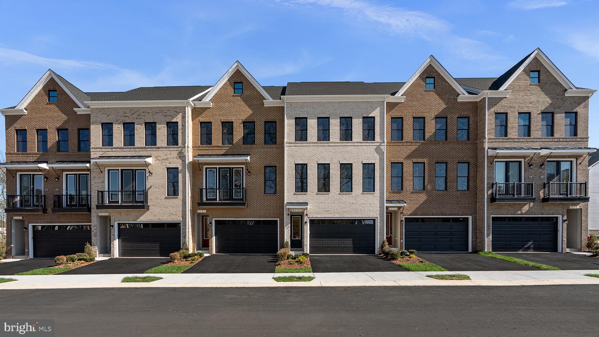 Discover brand new TOWNHOMES by Van Metre Homes at West Park III in Brambleton. Ready for you to move in LATE 2026- EARLY 2027 based on build time. Step into the Turner 22-F2-RT at West Park III—a two-car, front-load garage townhome with up to four bedrooms, up to three full bathrooms, and up to three half bathrooms. Built for flexibility and function, this floorplan offers a rec room or lower-level multi-gen suite, the choice is yours! Additionally, the home is complete with a cafe/breakfast area on the main level, a loft for entertaining, and seamless outdoor living with a deck and roof terrace—making room for every moment, indoors and out. The Turner 22-F2-RT offers build-to-order opportunities on select homesites, allowing you to personalize your new home. Explore a variety of professionally curated interior design packages at different price points to match your style and budget. Certain homesites also offer optional structural enhancements. Contact a Van Metre Sales Advisor to learn how you can bring your vision to life! Being a new build, your home is constructed to the highest energy efficiency standards, comes with a post-settlement warranty, and has never been lived in before! Take advantage of closing cost assistance by choosing Intercoastal Mortgage and Walker Title. Self-schedule a tour or explore your options by visiting our website or get in contact with a Van Metre Sales Advisor for more details!-----Welcome to West Park III, a vibrant neighborhood of dreamy townhomes with rooftop terrace options in the award-winning community of Brambleton, VA. Experience an exceptional living experience in Brambleton, a flourishing community where modern living meets suburban charm. This family-friendly community offers miles of trails, tot lots, parks, pools, highly sought-after schools within walking distance, and so much more at your fingertips. With the bustling Brambleton Town Center just down the street, you can enjoy endless shopping, dining, and entertainment options. Rise to new heights at West Park III and experience the perfect blend of comfort, convenience, and connectivity—a place where cloud nine is just the beginning. -----*Other homes sites and delivery dates may be available. Pricing, offers, and availability are subject to change without notice. Images, renderings, and site plans are for illustrative purposes only and may not reflect actual homes or features. Some images and renderings may depict interior designs created in collaboration with AI or may represent a similar home. Additional terms and conditions may apply. West Park III lies within the Airport Impact Overlay District (entirely within 1 Mile Buffer). Due to its proximity to Dulles International Airport, this site is subject to aircraft overflights and aircraft noise. Please see a Van Metre Sales Advisor for details