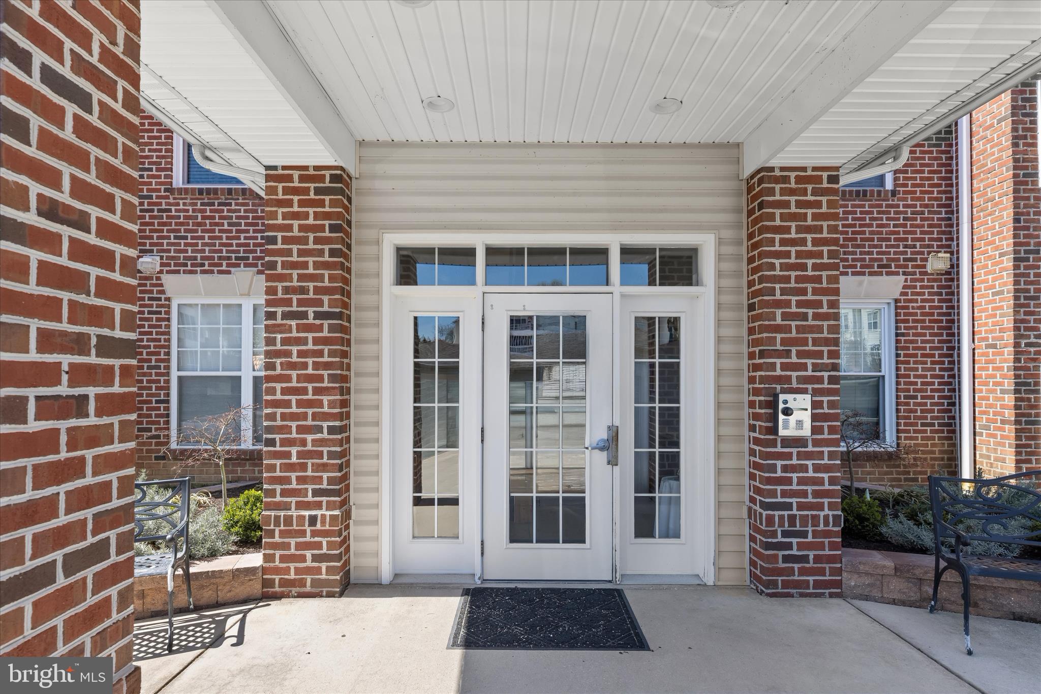 Welcome to easy living in this well-maintained 55+ community. This 2-bedroom, 2-bath condo with secured entry offers a spacious, light-filled layout designed for comfort and convenience. The hardwood foyer opens to a generous living and dining area accented by chair railing, crown molding, plush carpeting and a soft neutral color palette. Step outside to the private balcony, where mature trees create a colorful backdrop and a relaxing place to enjoy nature.
Back inside, the spacious eat-in kitchen features rich hardwood flooring, coordinating appliances, a center island, and a cozy breakfast nook. Just beyond the breakfast nook is a bright and versatile bonus room that can easily serve as a home office, sitting area, or additional dining space. Down the hall, the primary bedroom suite offers soft carpeting, a walk-in closet, and a private en suite bath. For added privacy, the second bedroom and second full bath are located on the opposite side of the unit. A separate laundry room includes a full-size washer and dryer.
This 1,310 square foot condo also stands out for its recent updates, including a newer HVAC system (2021), dishwasher (2022), paint and carpet (2023), new gas range (2025), and recently cleaned dryer vent. Gas heat adds to the home's overall comfort and efficiency. Conveniently located across from the Abingdon Library and close to shopping, dining, and I-95, this home offers a practical and comfortable lifestyle in a convenient setting.
Notes: Select interior photos have been virtually staged.