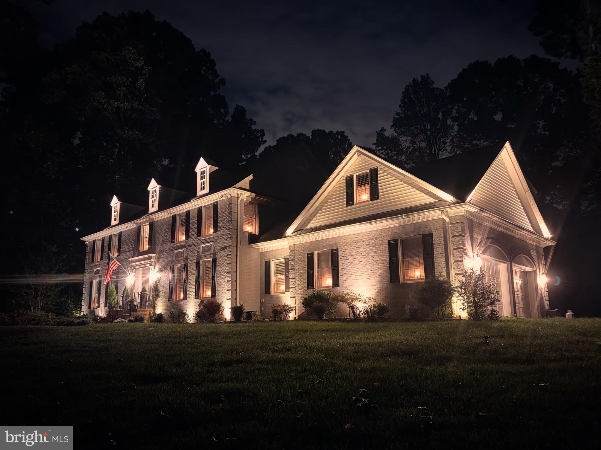 Nestled in a peaceful, park-like setting just steps from River Bend Park, this extraordinary custom-built home has been completely remodeled to perfection, blending timeless architecture with fresh modern design. Every inch has been thoughtfully reimagined to create a residence that is both sophisticated and inviting, ideal for today’s lifestyle of comfort, convenience, and effortless entertainment.

The dramatic entry opens to a breathtaking two-story family room anchored by a soaring stone fireplace and expansive windows that flood the space with natural light and views of the lush surroundings. The heart of the home is the brand-new gourmet kitchen, designed with the culinary enthusiast in mind. Featuring top-of-the-line appliances, custom cabinetry, quartz countertops, and a generous island, it’s as functional as it is beautiful. A sun-filled morning room extends from the kitchen, flowing seamlessly through the screened in porch to the expansive deck, an outdoor oasis that takes entertainment to the next level. Here, a sparkling pool and relaxing hot tub create the ultimate resort-style experience, while the surrounding space is ideal for alfresco dining and lounging.

The owner’s suite is a true sanctuary, complete with its own cozy fireplace, private balcony overlooking the grounds, a spacious sitting room, and a spa-like bathroom with luxurious finishes that provide the perfect retreat at the end of the day. Secondary bedrooms are equally well-appointed, offering space and comfort for family and guests.

The fully finished walk-out lower level is where this home truly sets itself apart - it redefines what a lower level can be. More than just a basement or man cave, it’s a showcase of style and versatility. Expansive recreation and media spaces, custom built-ins, and designer touches create an atmosphere perfect for both entertaining and unwinding. Adding to its appeal is a complete apartment with a full kitchen, private entrance, bedroom, and living area, offering ideal accommodations for in-laws, long-term guests, or an au pair. Outdoors, evenings are meant to be savored around the beautifully designed fire pit, creating a warm and welcoming gathering place under the stars.

Every detail has been carefully curated, from flooring and fixtures to lighting and trim, ensuring this home is truly move-in ready. While the setting provides serenity and privacy, the location is unmatched, just minutes to I-495, Tysons Corner, Great Falls Village, and all the conveniences of Northern Virginia. Coupled with its placement in the highly sought-after Langley School pyramid, this residence delivers not only luxury and comfort but also a lifestyle of distinction.

This is more than a home, it’s a private retreat, a showpiece for entertaining, and a sanctuary for daily living, all wrapped into one of the region’s most desirable communities.