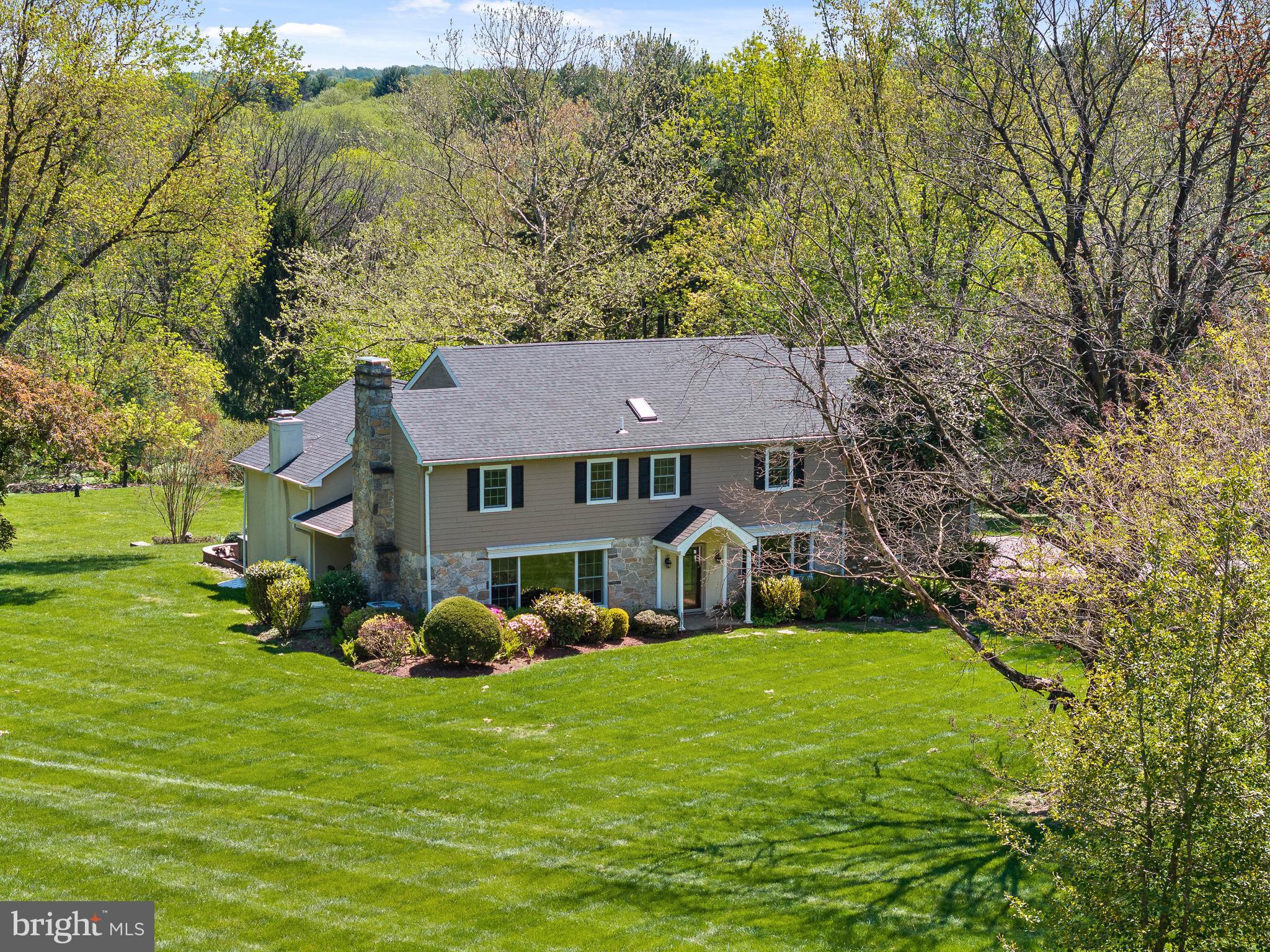 OPEN HOUSE CANCELED -ALL OFFERS TO BE SUBMITTED BY NOON TODAY 5/2 /26. Set on a beautifully level and meticulously maintained  2.4-acre lot in desirable Malvern, this spacious and thoughtfully updated and improved home offers the perfect blend of comfort, functionality, and timeless appeal. With five generously sized bedrooms, three full baths( the primary bath has a radiant heated floor ) and one bath in the finished lower level. There’s a convenient first-floor powder room too. The layout is designed to accommodate both everyday living and effortless entertaining.
The home welcomes you with light-filled interiors and gleaming hardwood floors throughout most of the first and second levels. A thoughtfully designed family room addition (2007) creates a warm and inviting gathering space, with wood burning fireplace, and patio doors to the rear. Theres an office/study area on the first floor with external access too. The convenience of an upstairs laundry room enhances modern living. Significant updates include a newer roof (2021) and all new windows (2011), reflecting the care and attention invested in the property. The property features a formal sitting room with a wood-burning fireplace and a formal dining room, both conveniently located near the kitchen, which was substantially renovated in 2017, making it ideal for family gatherings and dinners.
The fully finished basement (2010) expands the living space considerably, featuring a full bath, kitchen area, spacious recreation room with egress, and additional flexible areas ideal for guests, hobbies, or extended living—along with ample storage and utility space.
Step outside to enjoy the expansive, private grounds and generous patio—perfect for outdoor dining, entertaining, or simply relaxing in a serene setting. Additional highlights include an attached two-car garage, propane generator for essential systems, public water, and on-site septic.
Ideally located in a charming, established neighborhood within a highly regarded school district, this home offers exceptional convenience to major roadways, making commuting to Philadelphia, the airport, and surrounding destinations effortless.
Bright, spacious, and move-in ready—this is a home where comfort meets convenience, and where so many love to call home.