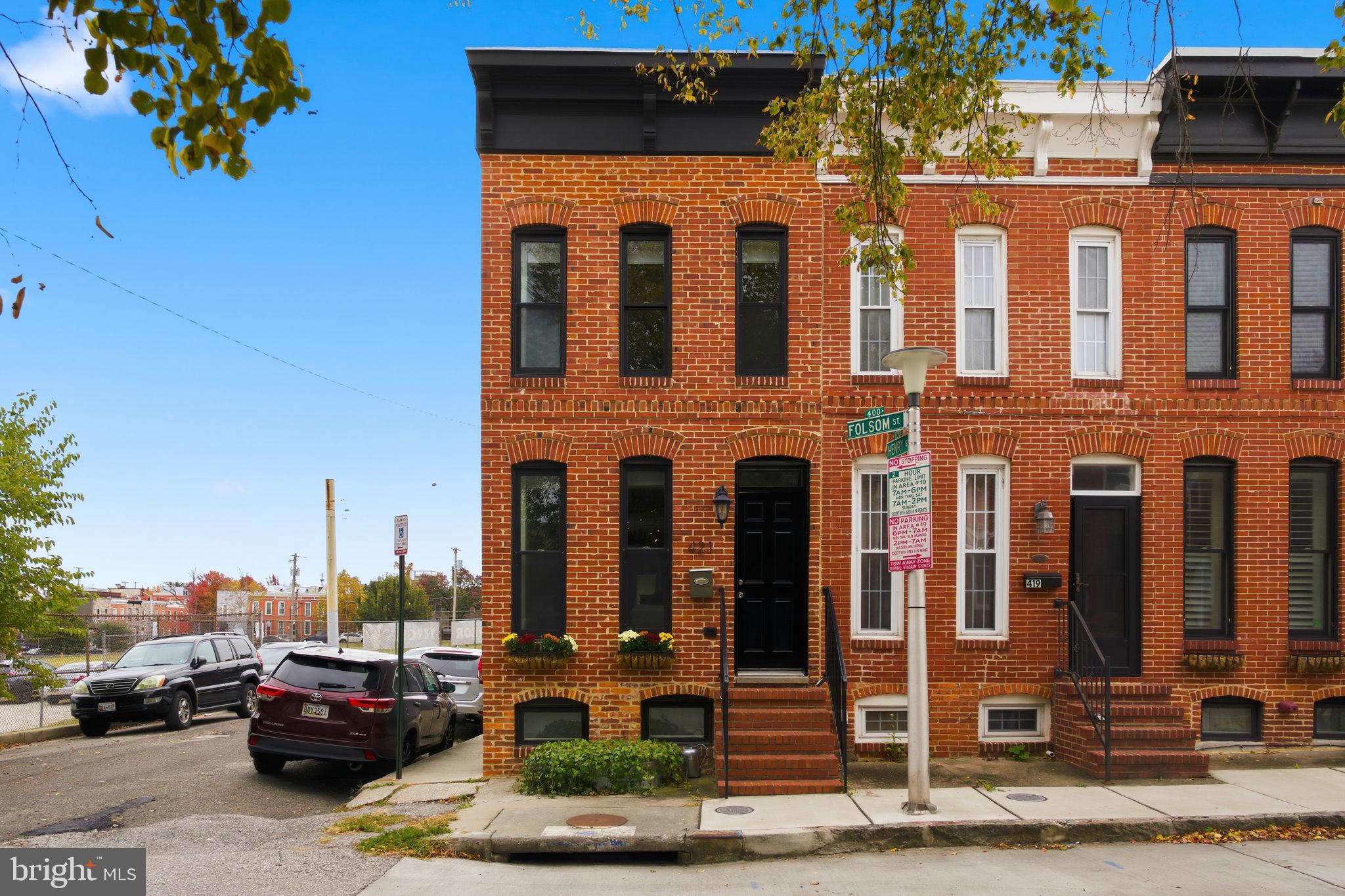 You won’t be able to resist this gorgeous, move-in ready end unit rowhome in the heart of Federal Hill / Riverside — with parking out back and approximately 2+ years remaining of the CHAP tax credit (buyer to verify)! Check out this 3 bedroom, 3 Full bathroom, 1 half bathroom end unit townhome. As you enter the home you'll have plenty of natural light on the main floor and be greeted by the exposed brick. The kitchen welcomes you with beautiful cabinetry, granite, stainless steel appliances, tile backsplash and eat-in island. Off the kitchen you have a half bathroom and designated entrance for your parking pad. The second floor welcomes you with two bedrooms, two full custom tile and glass bathrooms and a centrally located stackable washer and dryer. Off of the rear bedroom you have a two tiered freshly stained rooftop deck with stunning views of the Inner Harbor. Downstairs you'll find a finished lower level with the third bedroom and full bathroom, extra closet space and tons of additional storage options. Located on a quiet street just steps from Federal Hill/Rash Field Parks and the Waterfront Promenade. Close proximity to retail shopping, local dining and easy access to I-95. Lots of work was just performed to get it ready for the new owners! Schedule your private tour today!