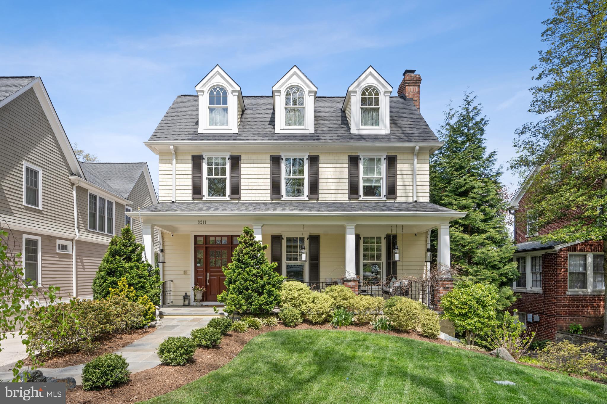 Welcome to 3211 Tennyson Street NW, a magnificent residence meticulously crafted by renowned builder Bob Holman in 2010, boasting quality construction and exquisite detailing throughout. This timeless home offers an unparalleled luxurious living experience in the heart of desirable Chevy Chase, DC.

Step inside to discover over 7,000 square feet on 4 levels with 9+ foot ceilings, custom doors and windows that flood the home with natural light, highlighting the intricate molding and fantastic room proportions with Craftsman style details. The main level welcomes you with a gracious entry featuring a coat closet, leading to a generous living room adorned with a fireplace and a stunning dining room perfect for hosting gatherings.

The gourmet table space kitchen is a chef's dream, equipped with top-of-the-line Thermador stainless steel appliances, leathered granite counters, and a handsome wood island with seating for four, seamlessly open to the family room featuring built-ins and a second fireplace with stone hearth, with access to the Ipe floored porch for al fresco dining and relaxation.  The side entrance from the driveway with deep pantry and powder room round off the main level.

Upstairs, the second floor boasts four bedrooms and three full baths, including the primary suite with a vaulted ceiling, fireplace, luxurious bath with an air jet tub, separate shower, and two walk-in closets. The fourth level offers versatility with a fifth bedroom or office space, complete with walls of custom bookshelves and a library ladder, a fourth full bath, and a finished attic nook with more built-ins, a window seat and dormers overlooking the front lawn.

The walkout lower level is an entertainer's delight, featuring a sixth bedroom, fifth full bath, laundry, storage, game room and recreation room with a fourth fireplace and custom wine bar and storage. An art/gym nook provides additional functionality and a door leading to the 2nd covered porch, yard and lower level firepit-perfect places for outdoor enjoyment under the stars.

Convenient amenities include a two-car detached garage and proximity to Rock Creek Park, Lafayette Pointer Park, and easy access to the red line metro via nearby bus routes. Don't miss the opportunity to make this extraordinary residence your own and experience the ultimate in luxury living in Chevy Chase, DC.