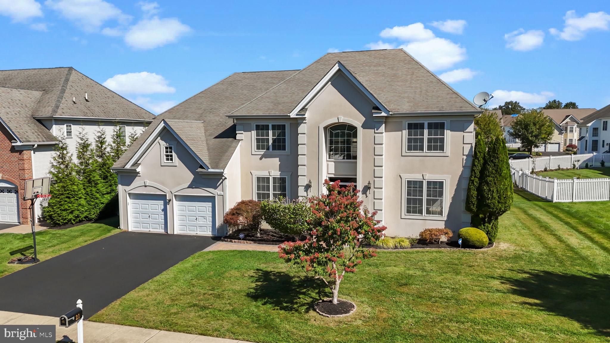 Multiple offers are received. Highest and best offers to be submitted by Sunday 5th at 6 pm with a written acceptance date of Monday 6th.  Seller is looking to close after November 7th. Welcome to Luxury Living in the Estates at Huntingdon Valley! Situated in the prestigious Estates at Huntingdon Valley, this exceptional 5-bedroom, 4.5-bath residence blends timeless elegance with modern comfort. Step into the grand two-story foyer and immediately notice the soaring 9-foot ceilings, detailed millwork, and exquisite craftsmanship. To the right, the living room is framed by decorative columns, while to the left, the formal dining room has been thoughtfully transformed into a library and playroom, complete with crown molding and wainscoting. The gourmet kitchen is a chef’s dream with 42” cabinetry, granite countertops, a spacious walk-in pantry, double wall oven, and a large center island ideal for both cooking and casual dining. Flowing seamlessly into the two-story family room, this inviting space is highlighted by a gas fireplace, custom molding, and wainscoting. The main level also offers a bright breakfast area with adjoining sunroom, a versatile office or bedroom with powder room, a laundry room, and direct access to the two-car garage. Upstairs, the luxurious primary suite provides a private retreat with a sitting area or office, two expansive walk-in closets, and a spa-like en-suite featuring dual vanities, soaking tub, separate shower, and private water closet. Additional bedrooms include one with its own private en-suite—perfect for guests—and two more that share a full bathroom.
Distinctive details such as dual oak staircases, gleaming hardwood floors, and custom trim add sophistication throughout. The finished basement expands the living space with endless possibilities—home theater, gym, or entertainment area—complete with a full bathroom for convenience. Outdoors, a custom paver patio sets the stage for barbecues, entertaining, or quiet evenings in the backyard. Located in the award-winning Lower Moreland School District and minutes from shopping, dining, train station (30-minute commute to Philadelphia), and major highways, this home offers the best of both luxury and location. Thoughtfully designed and meticulously maintained, it is truly move-in ready.