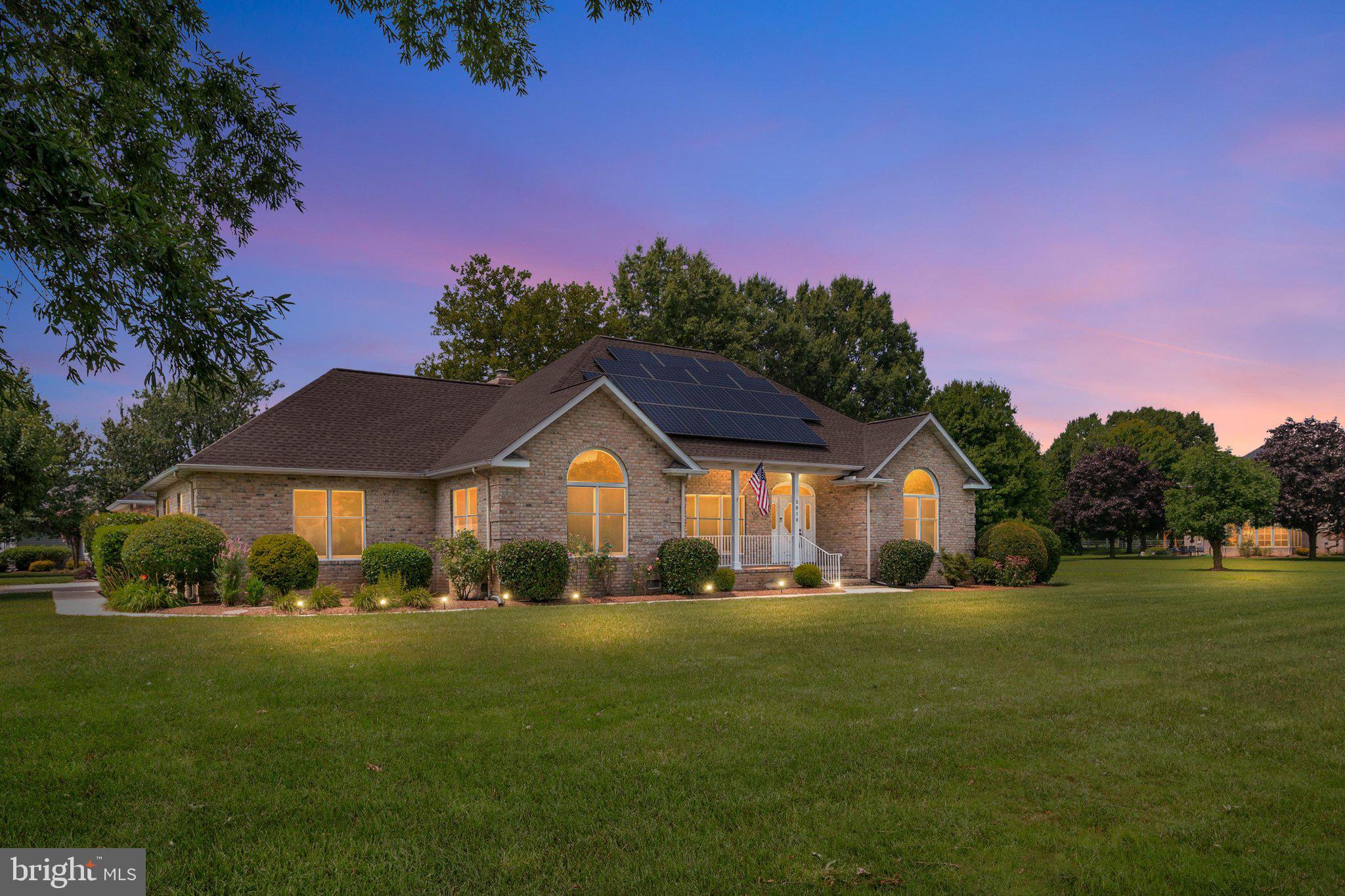 Welcome to Southwind, one of Kent Island's most desirable waterfront communities, where peaceful surroundings and an exceptional lifestyle come together. Perfectly positioned on 1.22 beautifully landscaped acres with water views, this inviting single-level home offers the comfort, space, and amenities you've been searching for.

Inside, you'll find three spacious bedrooms and three beautifully updated full baths, creating a home that is both stylish and comfortable. Freshly painted throughout, with newly refinished hardwood floors and plush new carpeting in the bedrooms, every room feels bright, fresh, and move-in ready.

The heart of the home is the welcoming kitchen, featuring gleaming granite countertops, crisp white cabinetry, a generous pantry with charming French doors, peninsula seating for casual meals and conversation, a vaulted breakfast area with a dramatic palladium window showcasing beautiful water views, and brand-new stainless steel range and refrigerator. Whether you're preparing dinner or gathering with family and friends, this space is designed to bring everyone together.

The adjoining family room is warm and inviting, centered around a cozy propane fireplace and accented by custom built-in bookshelves that add both charm and functionality. A sliding glass door opens directly to the slate patio, creating an effortless connection between indoor and outdoor living.

Just off the main living area, the light-filled dining room is surrounded by large windows that frame lovely water views, creating the perfect backdrop for everyday meals and special occasions. A versatile bonus sunroom offers even more living space and can easily serve as a cozy den, home office, or additional bedroom to fit your needs.

Step outside to enjoy the fenced backyard and slate patio, where a remote-operated awning provides welcome shade at the touch of a button, making it the perfect spot for morning coffee, evening sunsets, or weekend barbecues. Car enthusiasts, hobbyists, and those needing extra space will appreciate the oversized four-car garage. Above, an expansive unfinished area offers endless possibilities. Already plumbed for a future bath, it's ready to become a guest suite, home office, recreation room, or whatever your imagination inspires.

Energy efficiency is another standout feature, with owned solar panels and two Tesla Powerwall storage batteries helping to keep utility costs remarkably low while providing added peace of mind. 

Living in Southwind means more than owning a beautiful home—it's embracing a waterfront lifestyle. Residents enjoy access to the community boat launch, waterfront clubhouse, boat storage lot, pickleball and tennis courts, and scenic nature trail along the water. Whether you're launching your boat for a day on the Chesapeake Bay, enjoying an evening stroll by the shoreline, or simply relaxing at home while taking in the tranquil water views, this property offers the perfect blend of comfort, community, and coastal living.