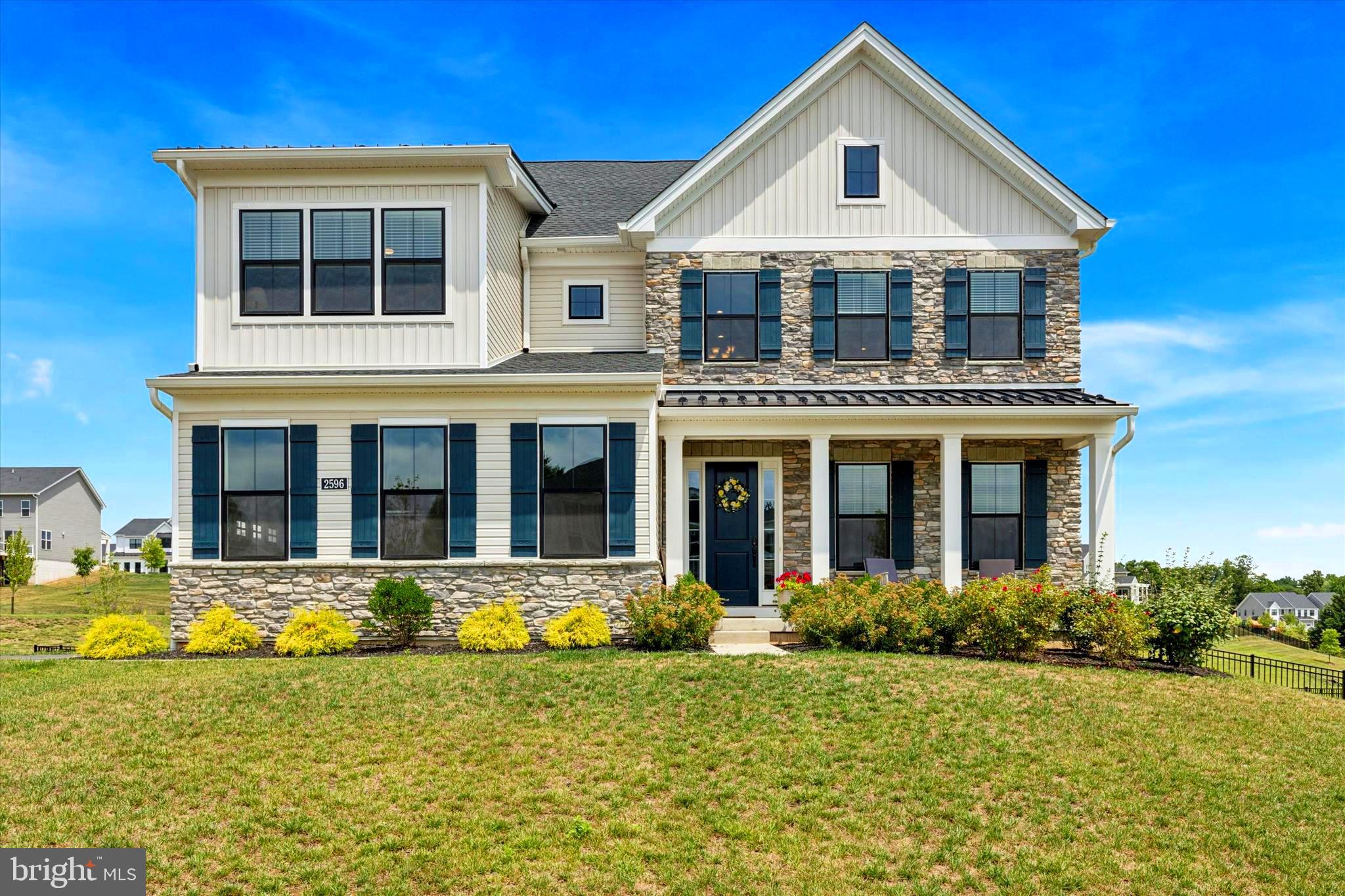 Finally--Here is an amazing opportunity to own a recently-built home in the established Reserve at Center Square Community!  If you missed out on the last new construction single-detached home built here, check out this 2yr-young Elverson Modern Farmhouse Model with so many upgrades!  Walk right in and enjoy luxury living immediately in this turn-key home with an upgraded, expanded eat-in kitchen, custom deck, and wrought-iron fenced-in backyard with a nature view.  The first thing you notice about this beautiful home is the gourmet kitchen--from expanded kitchen cabinets, to the immense high-end granite mega-island, to the soft-close pan drawers and under cabinet lighting, not one detail or convenience has been left out.  There is so much cabinet storage, you probably don’t even need the upgraded kitchen pantry closet, or buffet hallway to the formal dining room, currently used as a separate family media and game room.  The kitchen area is open to the grand living area with gas fireplace and oversized windows that almost reach the high ceilings.  The modern window treatments are included in this home, as well as the newly installed custom ceiling fans.   The kitchen area also expands into a eat-in dining area and continues out the sliding glass doors to the custom deck used for entertaining, BBQ grilling, walking down to your fenced-inyard, or just watching nature during beautiful sunsets. You can enter into this home through the front two-story foyer or through the custom mud room from your oversized two-car garage with plenty of storage plus room for parking 2 cars. 

Also on the main floor is the  large study, which has multiple uses as an additional guest bedroom or a den, plus a guest bathroom.  Upstairs there are 4 more sizable bedrooms, with 3 full bathrooms. The Primary Suite has walk-in closets, a sitting area, and a large Primary bathroom with double sinks.  With upgraded tile, faucets and floors, this home hasn’t left any detail unturned, as additional upgrades were made after construction that only homeowners can know after they live there that are essential to luxury living such as custom blinds, an expanded driveway, outdoor basketball hoop, custom lighting in eat-in kitchen, designer ceiling fans, and the state-of-the-art refrigerator, washer and dryer.  On the lower level, you can continue the seller’s original plan of finishing the impressive walk-out basement, which is already plumbed out for the next owner’s full bathroom, possible wet bar, Game Room, fitness room and personal movie theatre.  

This vibrant community at the Reserve is welcoming to newcomers with plenty of opportunities to meet your neighbors at the monthly block parties, chili cook-offs and holiday celebrations.  Location is super convenient for this neighborhood, from the downtown area of Skippack, to Blue Bell, Lansdale, Plymouth Meeting with a tons of shops and restaurants, and 202, 476, and the 276 Turnpike make your commute to work a breeze.