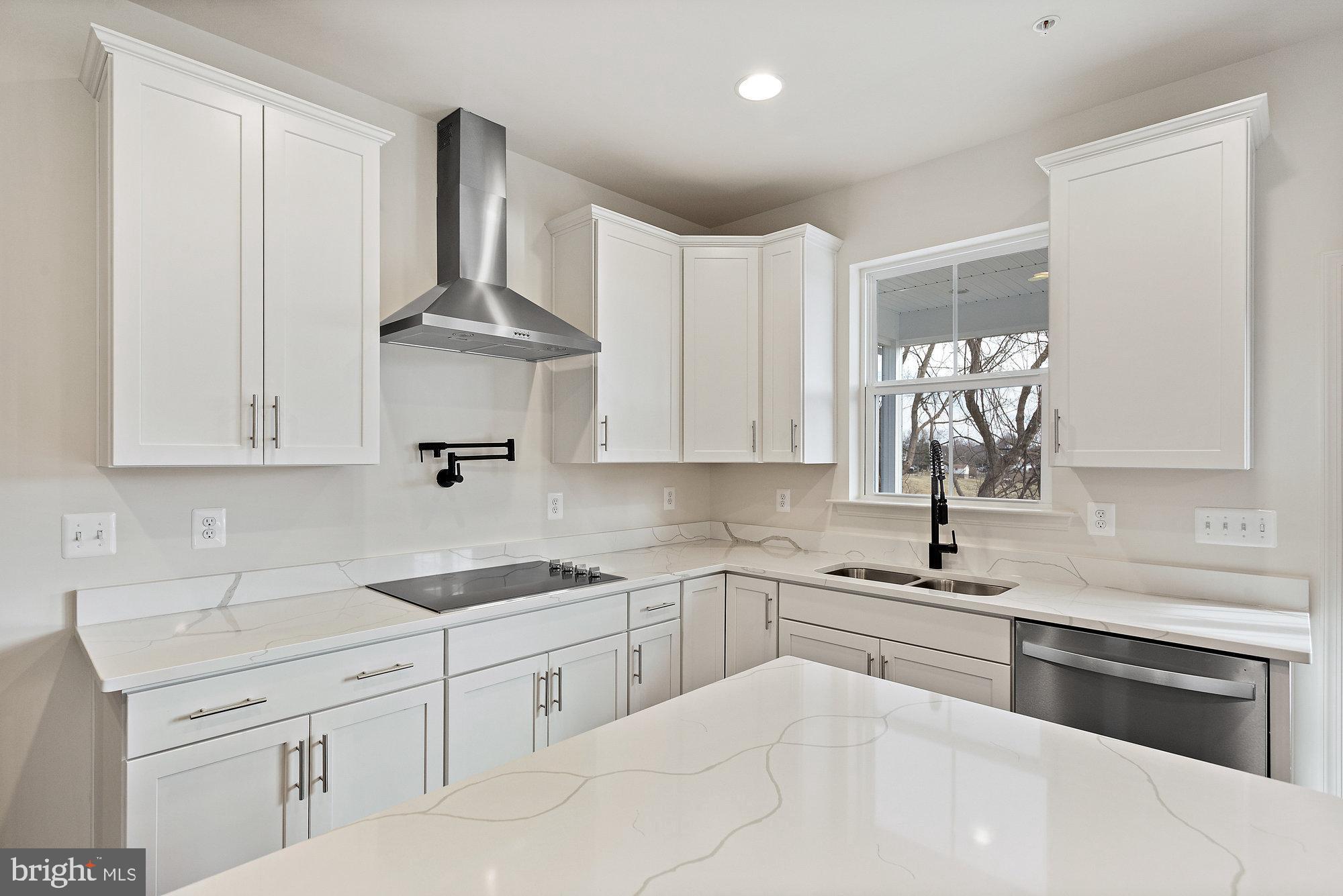 Discover the potential of this stunning new construction home, designed with a Craftsman architectural style that exudes warmth and charm. Nestled on a generous 0.9-acre lot, this residence offers panoramic views that invite you to unwind and enjoy the beauty of nature right from your doorstep. With 4 spacious bedrooms and 2.5 bathrooms, this home is thoughtfully laid out to accommodate both relaxation and entertaining. The interior features luxury vinyl plank flooring, providing a stylish yet durable foundation for your personal touches. The unfinished basement with a rear entrance and walkout level presents an exciting opportunity for customization—imagine creating a cozy family room, a home gym, or even a guest suite tailored to your lifestyle. The exterior boasts a combination of materials, including a striking stone water table and accent front, ensuring curb appeal that stands out. An attached front-entry garage with space for two vehicles adds convenience to your daily routine. Envision the possibilities of making this house your home. The thoughtful design and excellent condition of the property promise a comfortable living experience, ready for you to infuse it with your unique style. This is more than just a house; it’s a canvas for your dreams. Don’t miss the chance to claim this exceptional property and create lasting memories in a space that truly feels like home. Contact us for your home tour
