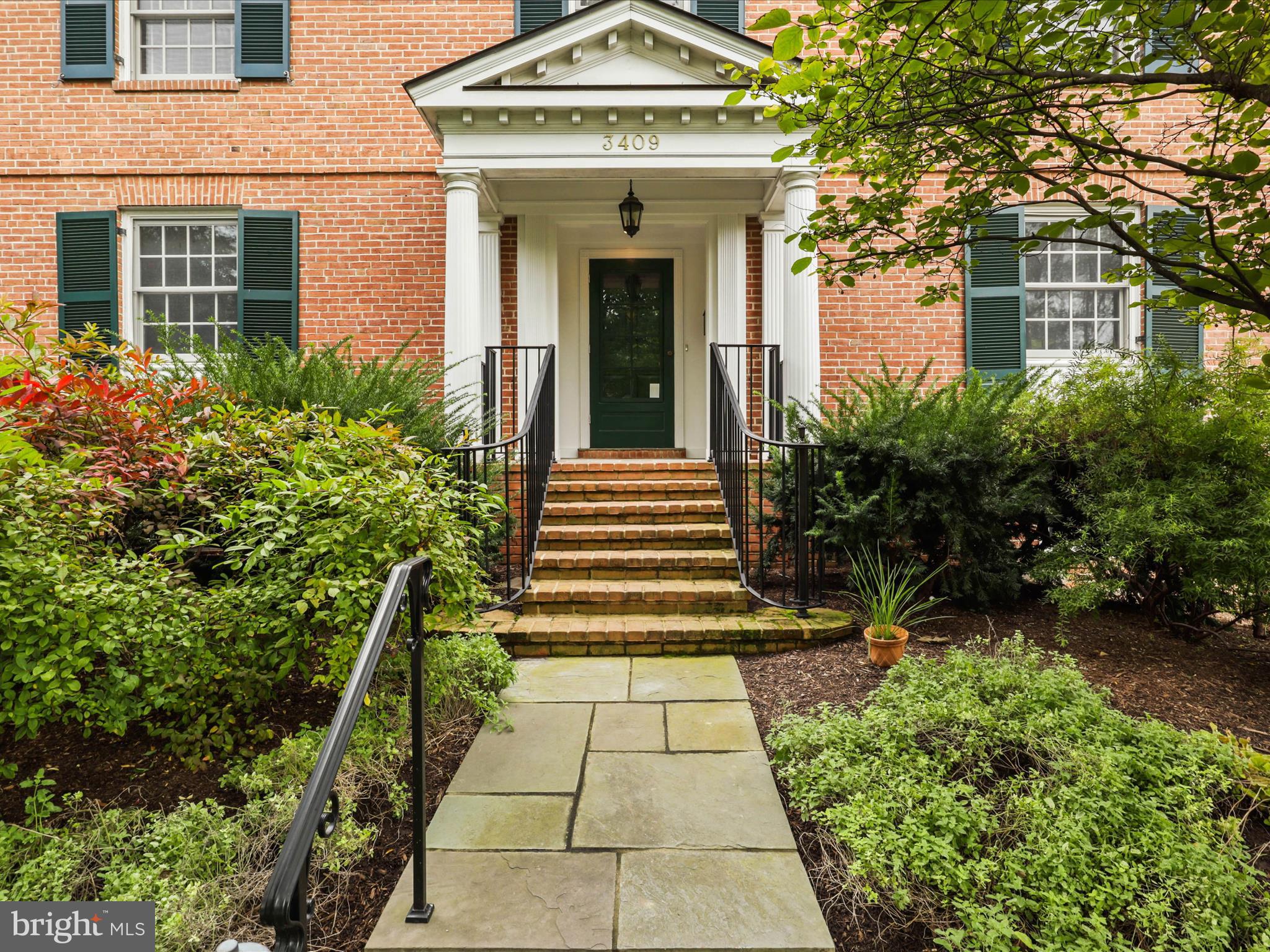 Touted as the  best  street in  Country Club Hills  (and certainly a pretty one) where homes are rarely for sale, 3409 Albemarle St.  is  ready for you!  Take advantage of the NEW VALUE!!!   Built in 1950,  with several expansions/renovations during the longtime ownership of the current owners who purchased in 1998.  This gracious 4-bedroom 4.5-bathroom Colonial offers the flexibility of today's home lifestyle yet retains the original  gracious design for you to enjoy.  If formal entertaining is something you like to do, the main floor offers a large dining and living room with a generous arrival foyer for just that.  If you prefer casual living,  the family room/casual dining area off the kitchen with walls of windows  opening  to a shaded and private patio is inviting indeed.  Feels a bit like being in the country or the hills!    The sunroom off the living room with  its own wall of windows captures pleasing  views of the well- manicured mature grounds and  your own English Garden.   The second patio extending off the  sun room is perfect for al fresca dining complete with a water feature for a truly relaxing setting. Need a home office?  You have a choice: one on the main level tucked away in a quiet spot  or if you wish, the  upper level offers one as well.  
The upper level consists of a spacious primary suite with vaulted ceiling in the bed area, two separate closets,  and a  beautiful high-quality full bath...timeless with classic style tile,  Nickel faucets, beautiful inset cabinetry, tub and shower.  3 additional bedrooms (one with ensuite bathroom) and full hall bathroom plus the office/sitting room complete this floor.
The lower level has an additional family room with a cozy fireplace, full bath, workroom, laundry and 2 storage rooms. The 2 car garage is accessed on this level as well.
The walk-up attic has great potential for renovation...tall ceiling height and good space.  
Plaster walls, slate roofing and  hardwood flooring (just refinished) is on both levels; recessed lighting has been added, new quartz countertops, new stainless steel appliances have just been installed in the kitchen.  The interior of the home has just been painted.  It is truly in move-in condition....just add furniture!!! 
This is a unique opportunity to acquire a stately home on iconic Albemarle St.  Come see!