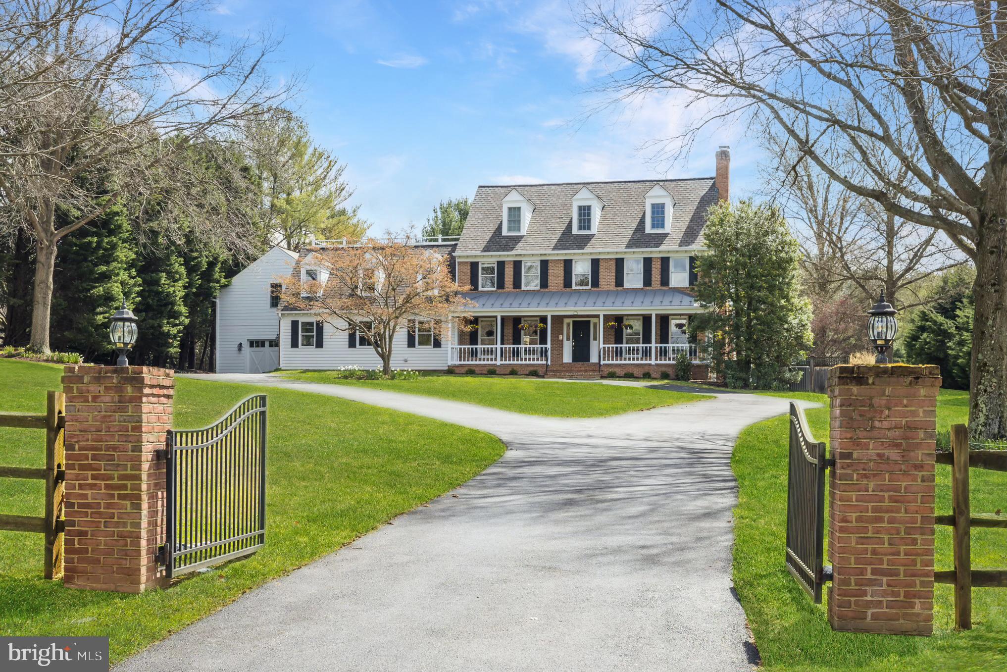 1ST OPEN Saturday 4/6,  2-4PM & Sunday 4/7,  1-4PM. Nestled on three acres in the heart of Belvedere, this stunning custom residence has been renovated and expanded to perfection, offering the perfect balance of formal and informal living spaces within a framework of classic architectural style. The European-inspired interior is enhanced with gorgeous millwork, exposed brick, designer lighting, and built-in furnishings that elevate the concept of form and function to a new level. The outdoors is seamlessly blended into the fabric of the home, which offers 4 bedrooms, a bonus room, 5 full baths, and every option for living, entertaining, professional pursuits and leisure. The main level features a large office with built-ins, a formal living room, an expansive great room with one of the home’s 4 fireplaces, and the kitchen of any chef’s dreams.  Outfitted with custom Wood Mode cabinetry, a handmade range hood, professional series appliances and a glossy ship-lapped ceiling, the spacious kitchen offers island seating for five yet retains a warm and inviting character.  A sunlit breakfast/dining room is adjacent, and the main level also features a mudroom with cabinets and lockers…even a custom pet washing station.  For the fitness enthusiast, the expansive turf-floored home gym will not disappoint! Part of the genius of the design in this home is the flexibility of the living space.  So accommodating for a large or multi-generation household, the private spaces are incredible.  There is a wing with a homework/reading area and 4 bedrooms on the upper level.  The primary suite includes beautiful built-ins, a fireplace, a renovated bath and access to a deck overlooking the bucolic rear grounds.  The other bedrooms all possess a personality of their own; from the triple-dormered space with window seating to the delightful bedroom with deck access.  All 5 baths in the home have been renovated with exquisite tilework and state-of-the-art fixtures.  The walk-out lower level has been masterfully updated to the same standards; the lounge area features a custom bar and a “candy wall” shelving system, the movie room is complete with built-in technology storage, and the game nook invites friendly competition to go on for hours!  Step outside to a private outdoor oasis, which includes a covered patio with a grill, a fabulous new saltwater pool and extra large hot tub, a paved walking path, and a level lawn that could easily accommodate the most luxurious pool house. Implementing every amenity for the modern lifestyle, the owners added laundry facilities on two levels, automatic lighting, electronic window treatments, precision temperature controls, and 4 energy efficient HVAC systems. Brimming with timeless old-world character while offering state-of-the-art livability, this home is truly extraordinary!