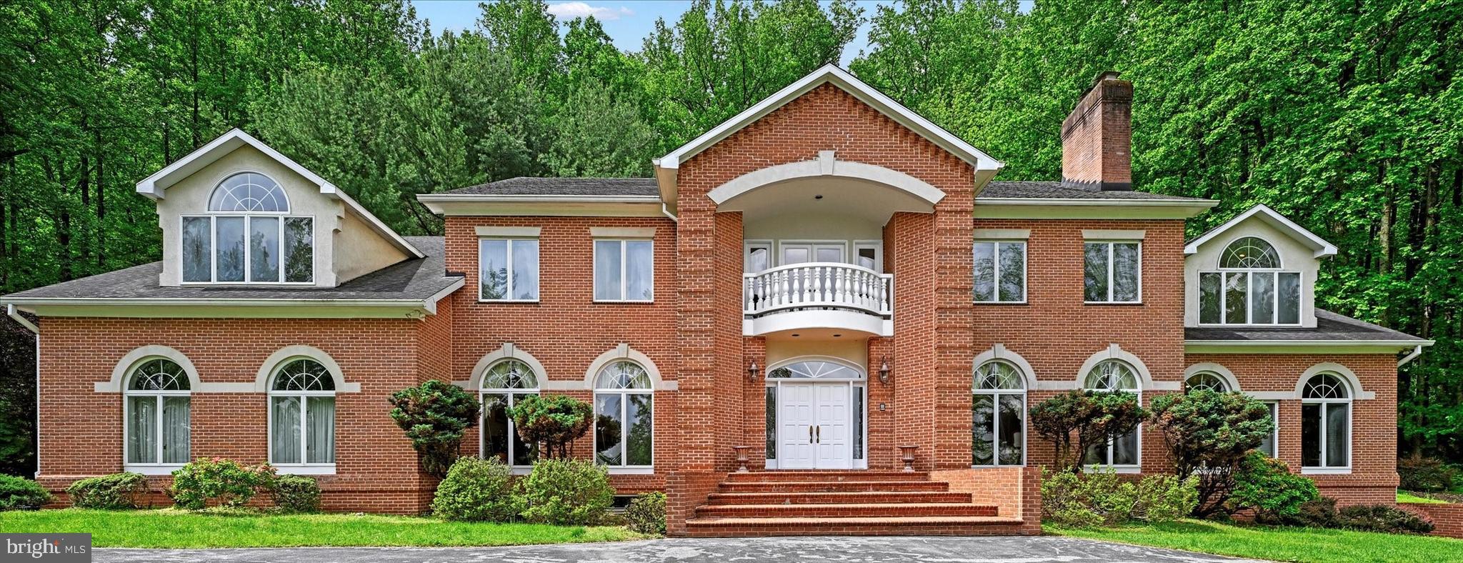 Seller is highly motivated to sell! The market value of this property was recently assessed at $1.7M by
Baltimore County., and the listing price was $1.55M before. However, NOW , it is reduced to $1.39M. The property will be sold as AS-IS conditions Don't miss this rare opportunity to make it your dream home!

Set on 7 acres with special design and higher grade building code, the beautifully landscaped grounds offer over 9400 total square feet, featuring 6-Bedrooms, 5-Full Baths, oversize 3-Car Garage. Fantastic Ivy Hill location with stellar views of hunt valley, one of most sought-after areas in Baltimore County. The house is nestled on the hillside through a private driveway that exudes an air of exclusivity and tranquility. Looking down at the views surrounded by lush greenery and towering trees, a sense of anticipation builds, drawing you closer to the treasure that awaits. As you step inside, you'll be greeted by a dramatic foyer with high ceilings, marble floors laid on a diagonal, a curved staircase and a stunning chandelier that cascades a warm glow throughout. Through the foyer, a fabulous family room offers rustic elegance along with a stunning two-story high ceiling with a fireplace, built-ins, and a wall of French doors with large radius transoms allowing an abundance of natural light. On the left side of foyer, a spacious generously proportioned dining room awaits. While, on the right is the cozy living room, with a fireplace, invites you to unwind and enjoy moments of quiet contemplation, while the adjacent formal dining room sets the stage for memorable gatherings and celebrations. Adjunct to the living room, a huge customer designed library awaits with walnut built-ins and wood burning fireplace. In the main floor, customer designed spacious gourmet kitchen with a center island with countertops is complemented by a spacious eat-in area with a dome ceiling and window surround that seamlessly connects you to the outdoor living area. For more formal occasions, the dining room offers an elegant setting. Upstairs, the luxurious primary suite with a sitting area, two walk-in closets. Spa-like bathroom equipped with marble flooring, a relaxing jacuzzi tub, and a walk-in shower, etc. In addition, there are four additional bedrooms, all generous in size with plenty of closet space and two full bathrooms upstairs. A convenient guest bedroom is on the main floor with a full bathroom. At the lower level, the huge unfinished basement with walk-out that offers so many possibilities! The house surround is a private paradise with a circular drive, a two-car garage, abundant storage space, mature trees, and a spectacular patio for enjoying the serene surroundings. The house offers a seamless blend of indoor and outdoor living, creating a harmonious flow that enhances the overall living experience, inviting nature's beauty to become an integral part of your daily life. The house is more than just a home! Schedule your private tour today and experience the allure of living at its finest.