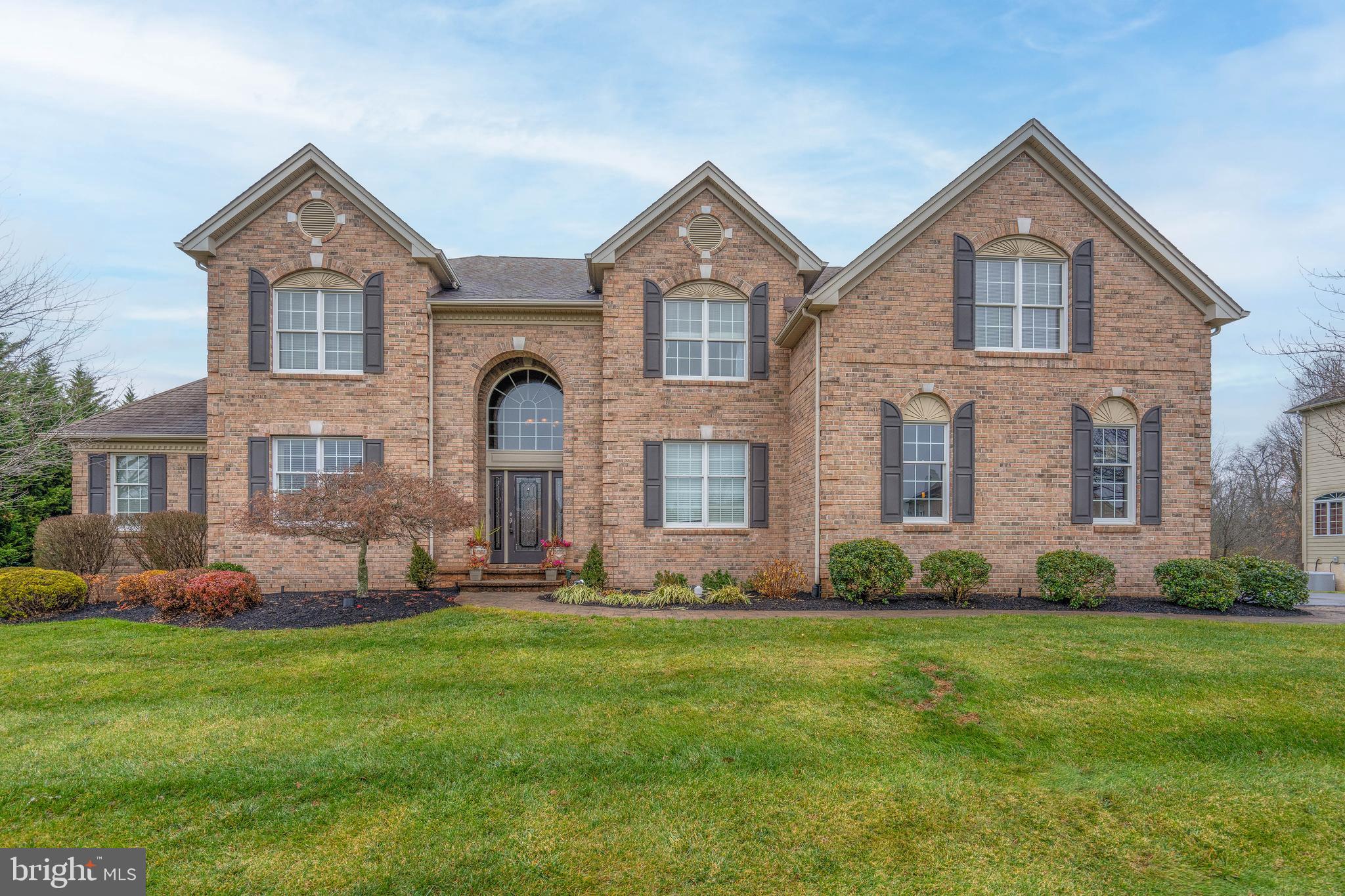 Welcome to one of Bucks County's most prestigious and sought-after communities, Chapman's Corner, in the sought after Council Rock School Disctrict.
This magnificent 4 Bedroom, 4.5 Bath brick-front Colonial offers an unrivaled blend of sophistication and serenity. Enjoy a private, executive lifestyle just minutes from the boutique shopping, gourmet dining, and convenience of Newtown.

Step inside the dramatic two-story foyer, featuring a sweeping curved staircase that sets a luxurious tone. The main level flows effortlessly with rich Cherry hardwood floors throughout the expanded Hopewell design. Host spectacular gatherings in the formal living and dining rooms, or retreat to the private office behind elegant French doors.

The true highlight is the sun-drenched, architecturally stunning CONSERVATORY featuring three walls of expansive windows—the perfect place to relax year-round!

The heart of the home is a true professional-grade kitchen, designed for the serious chef! It boasts commercial-grade stainless steel appliances, custom cherry cabinetry, and premium granite countertops. The oversized breakfast area offers casual dining with direct access to the magnificent, two-story Family Room, complete with a stately fireplace and a convenient back staircase. 

Step into your private retreat! The fully fenced backyard is an entertainer's paradise, featuring a sparkling in-ground pool, an expansive 8-person hot tub, and a gorgeous stamped concrete surround. Enjoy summer days on the additional Trex sun deck, or BBQ on the illuminated main Trex deck while overlooking a serene, wooded backdrop.  Enter the kitchen directly from the Trex Deck, making outdoor dining easy and accessible.

The fully finished walkout basement offers an additional floor of exceptional living space! This level is designed for ultimate recreation and comfort, featuring:

A dedicated Media Room (complete with surround sound!)
A sleek, custom Bar/Kitchenette (cherry cabinets, granite counters, sink, dishwasher, and wine refrigerator)
A spacious Exercise Room.
A luxurious full bath with an oversized shower.
A versatile 5th Bedroom/Office/Guest Suite.

Move-in Ready: Tastefully finished in neutral tones, equipped with main and lower-level surround sound, and located in an upscale subdivision known for its rolling landscapes, cul-de-sac streets, and tree-lined sidewalks.
Super Close to Shopping and Restuants and Major Roadways into NJ and PA!

This rare opportunity to own a luxury estate in Chapman's Corner will not last!