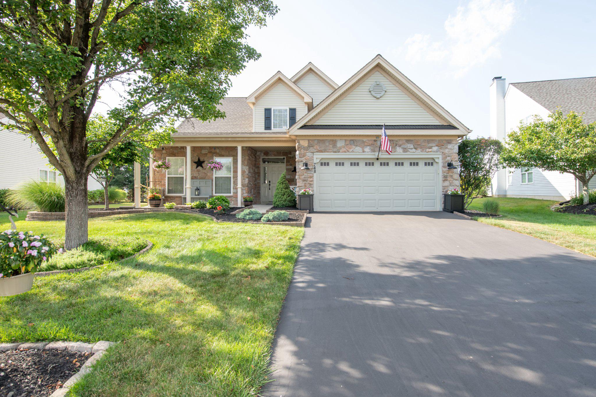 Welcome to 748 South Settlers Circle in the highly sought-after Legacy Oaks, a premier 55+ community in Warrington. This beautifully maintained 3-bedroom, 3-full-bath home offers the perfect blend of elegance, comfort, and convenient first-floor living.

Step inside to discover a thoughtfully designed floor plan featuring a private office/den, formal dining room, and a stunning living room highlighted by a stone gas fireplace with a blower, providing warmth and ambiance throughout the home.

The spacious kitchen is sure to impress with abundant wood cabinetry, granite countertops, stainless steel appliances, and a sunny breakfast nook—perfect for enjoying your morning coffee or casual meals.

The first-floor primary suite offers a peaceful retreat with a spacious bedroom and an elegant en-suite bathroom featuring a soaking tub, separate shower, and tasteful finishes. A convenient first-floor laundry room, complete with washer and dryer, provides direct access to the attached two-car garage.

Upstairs, you'll find a generously sized second bedroom with a large double closet, a full bathroom, and an expansive loft area ideal as a sitting room, family room, hobby space, home office, or guest retreat. An additional third bedroom offers flexibility for guests or extended family, while extra storage space provides even more versatility.

Enjoy the carefree lifestyle Legacy Oaks has to offer, with beautifully maintained grounds and all the benefits of an active 55+ community. This exceptional home combines spacious living, timeless elegance, and everyday convenience in one of Warrington's most desirable neighborhoods.

Schedule your private tour today and experience all that this beautiful home has to offer!