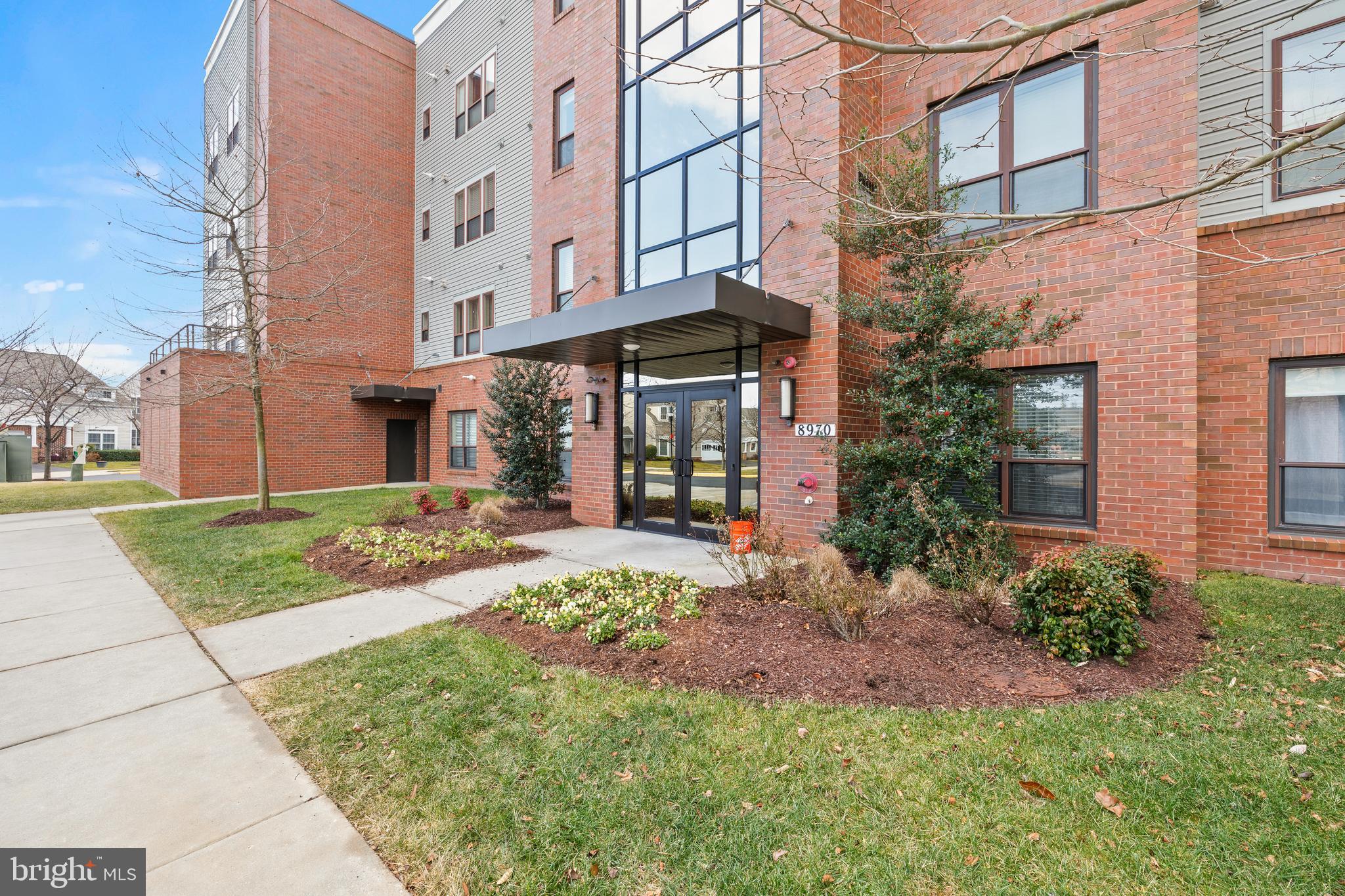 Welcome to the lovely BEAUMONT model condominium at 8970 Fascination Court #412.
NEW Carpet and Paint throughout this is the midsize of the five different models. Step into an inviting two bedroom two bath home on the top floor in the desirable Spring Hill 55+ active community. This lovely home, greets you with an open and light filled living space that flows seamlessly to a private balcony with gorgeous views in both bedrooms and the living room.   The balcony is perfect morning, coffee, or relaxing as the day winds down. Designed interior offers, generous room sizes throughout creating a comfortable atmosphere.  This full-size kitchen has  granite countertops and lovely wood cabinets, tiled floor, and a stainless sink with a new faucet.    Built-in microwave, gas stove, refrigerator, dishwasher, and room for a table and chairs. Plus a pantry and the laundry room with a full-size washer and dryer immediately off the kitchen.  
A separate dining room is large enough to comfortably entertain 6-8 guests. The master bedroom has two closets, one walk-in and the large bathroom has both a soaking tub as well as a full-size shower with a built in tiled bench. Grab bars, add additional security.  
A very large bonus to this unit is a garage that can be accessed from the inside of the building.  Plus a second parking space on the outside.  

This home forms part of a vibrant community rich in amenities. Residents enjoy access to a lovely clubhouse where you can socialize or unwind, an indoor heated pool and jacuzzi for year-round relaxation, and a fitness center to help you stay active without leaving home. The clubhouse also houses a billiards room, dance room, banquet room, and a game room, providing a variety of spaces for entertainment and gatherings. Outdoor living is equally delightful with tennis courts, a playground, bocce court, scenic garden paths and gardens, and a bike/jogging trail that meanders through the community. A large gazebo invites quiet moments and gatherings amidst peaceful surroundings.

Spring Hill’s amenities are designed to support a full and engaging lifestyle, with plenty of opportunities for recreation, connection, and relaxation right at your doorstep. Whether you’re looking to stay active, entertain guests, or simply enjoy serene views from your balcony, this condo offers the perfect blend of comfort and convenience in one of the area’s most welcoming communities.