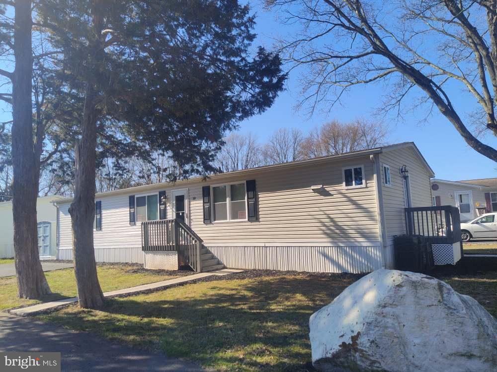 3 MONTHS FREE GROUND RENT!!! REMODELED DOUBLE WIDE IN SOUGHT AFTER DARLINGTON MEADOWS SITTING ON A CORNER LOT.   UPGRADES INCLUDE NEW SIDING, NEW WINDOWS, NEW STORM DOOR, NEW PAVER WALKWAYS,  NEW SHUTTERS, PORCH LIGHTS, NEW KITCHEN CABINETS, COUNTER TOPS AND APPLIANCES.   NEW BATHROOM VANITIES, TOILETS AND TUB WITH TILE SHOWERS,  NEW LIGHT FIXTURES THROUGHOUT.   FRESHLY PAINTED, LAMINATE FLOORING WITH NEW CARPET.   NEW FIREPLACE INSERT WITH TILE.   NEW A/C AND FURNACE IS ONLY 2 YEARS OLD.   THIS HOME SHOWS LIKE A MODEL.  ITS A MUST SEE!!!   HOME SITS IN MOBILE HOME PARK AND GROUND RENT IS $880 PER MONTH AND INCLUDES WATER.