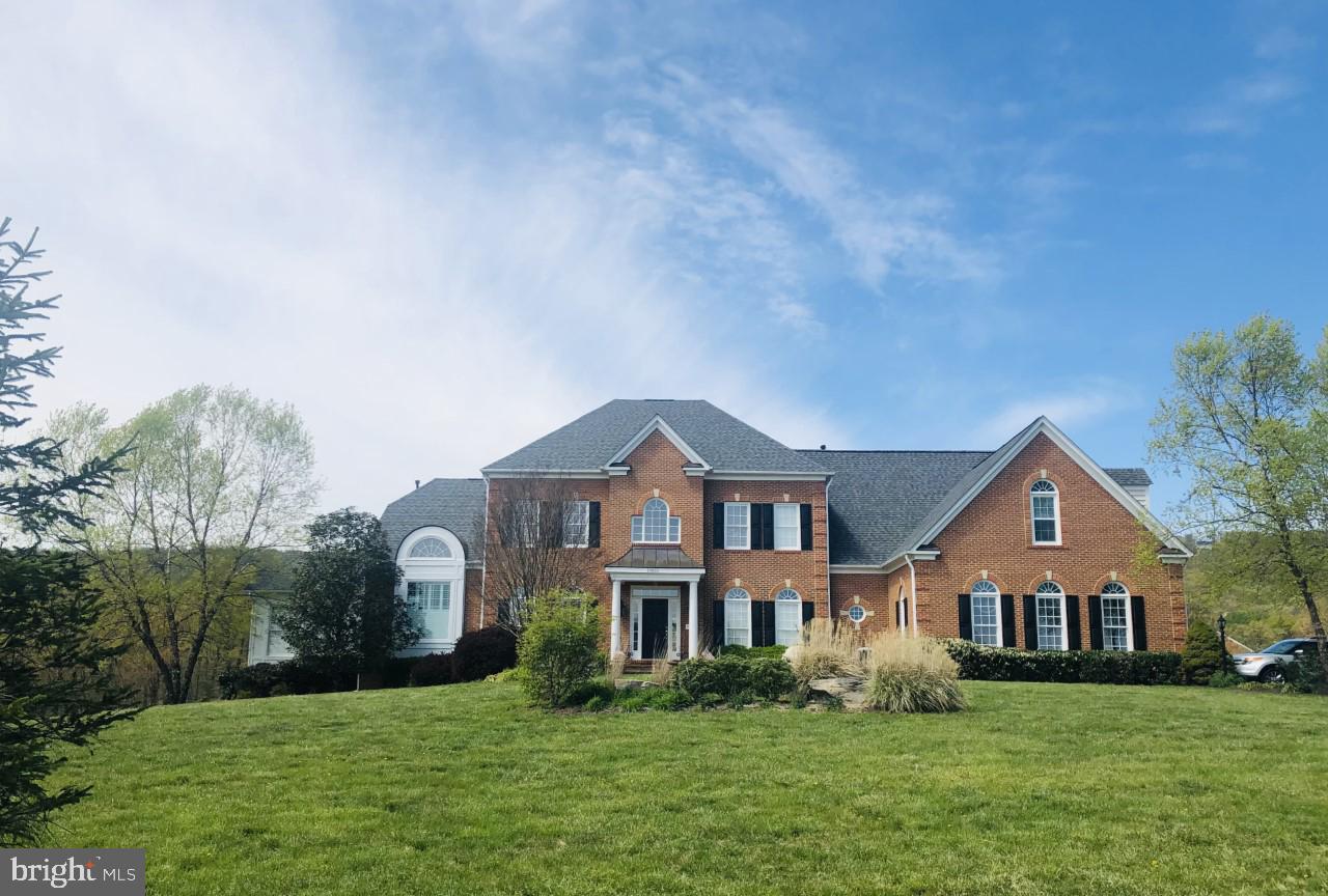 THIS IS IT…  If you’ve been waiting for a beautiful home on a quiet and peaceful property that is in an ultra convenient location, you have found it! This 8,500+ finished sq ft inviting home with 6 bedrooms and 4 full & 2 half bathrooms has it all! The gracious front porch patio is perfect for greeting guests and enjoying the beautiful sunrises! The scenic mountain vistas & wildlife are abundantly enjoyed from the back deck, screened in gazebo, and the intricate hardscape surrounding the heated (year-round) in-ground pool with built-in hot tub. Sit around the fire pit and enjoy your evenings under the stars. The home is serenely situated on 10+ acres where fencing and horses are welcomed. Natural Light greets and ushers you into the 2 story entry and 2 story great room. The 10’+ ceilings are felt throughout the spacious main and upper levels. The beautiful dining room and living room are the perfect size for entertaining. The sought after MAIN LEVEL MASTER SUITE has an expansive sitting room with a built in desk & shelving along with a cozy fireplace to enjoy a true retreat. The gorgeous master suite bathroom has his & her toilet areas, his & her sinks and his & her shower faucets. Quality shows throughout this home with custom paint, designer light fixtures, exquisite crown molding, vaulted shiplap ceiling, and large beams in the kitchen. The sunroom off of the kitchen provides another way to see the dynamic views from inside the home! The modern kitchen with white cabinets and stainless steel appliances also has a back stairs to the top level. You will love the ultra-convenient Jack and Jill bedrooms and bathrooms upstairs! Each bathroom exudes privacy as the toilet and sink areas are set apart rooms from the showering areas. The 4 bedrooms are perfectly sized with plenty of room. As you journey down to the bottom level, you will be pleasantly surprised at how much room can be enjoyed! Gaming, Media, Relaxing, Working Out, Sleeping and more. The many rooms on this level consist of a family room, two recreation areas, wet bar, a large bedroom with full bath, a very large den/media room, an extra finished small room which would be ideal as a wine cellar, and two large unfinished rooms in the basement for your storage needs (increasing footprint to 10,000 sq ft) or use one of them for a workout room! This exquisite well maintained home (owned by only one owner) is complemented with a 3 car side-load garage. Besides the gorgeous views, sensational pool plaza, and beautiful home… location is the key! Enjoy the country setting that is just minutes from dining and shopping and (very importantly) conveniently located with easy access to Hwy 15, I 66 and Hwy 50. Comcast is currently used for Internet but Verizon Fios is currently getting installed and will be ready in just a few short months. New roof was installed in 2019. Master Bathroom and basement full bathroom remodel in 2020. New flooring in upstairs bathrooms 2021. Resurfaced Driveway in 2019. Pool (43' x 22'), Walkway, Patio, Fire Pit and Piers by Driveway added in 2015. Owners will provide professional opening of pool for the spring/ summer season as a courtesy to buyers.