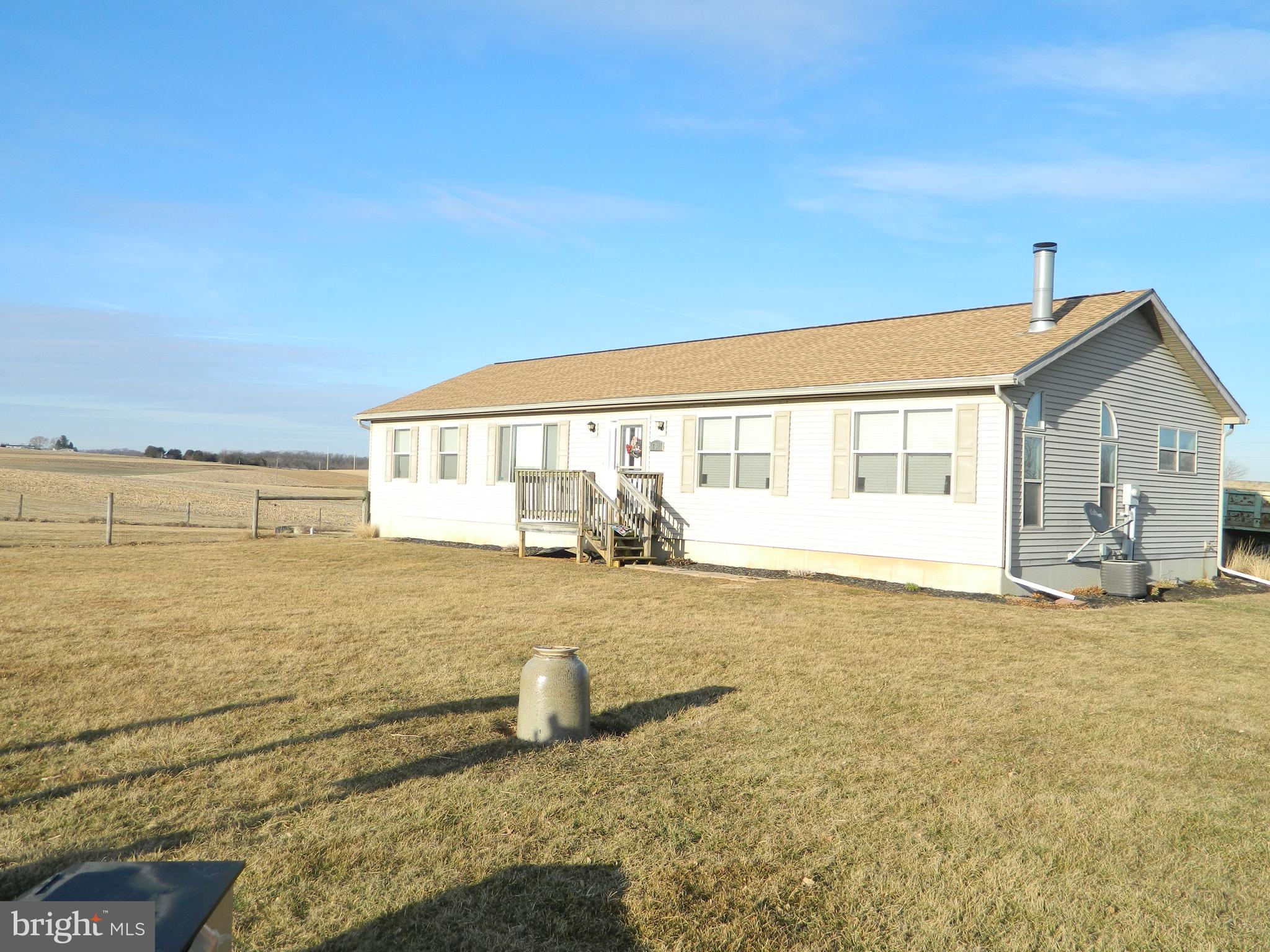 Awesome Large 3 Bedroom 2 Full Bath Rancher. This home is sitting on an acre lot, and surrounded by farm land. Great eat-in kitchen with island, and office area tucked away on the side. Inviting family room with wood burning fireplace. Spacious separate living room. Primary suite with double closets and private bath. Full unfinished basement provides loads of storage and is just waiting for your ideas.