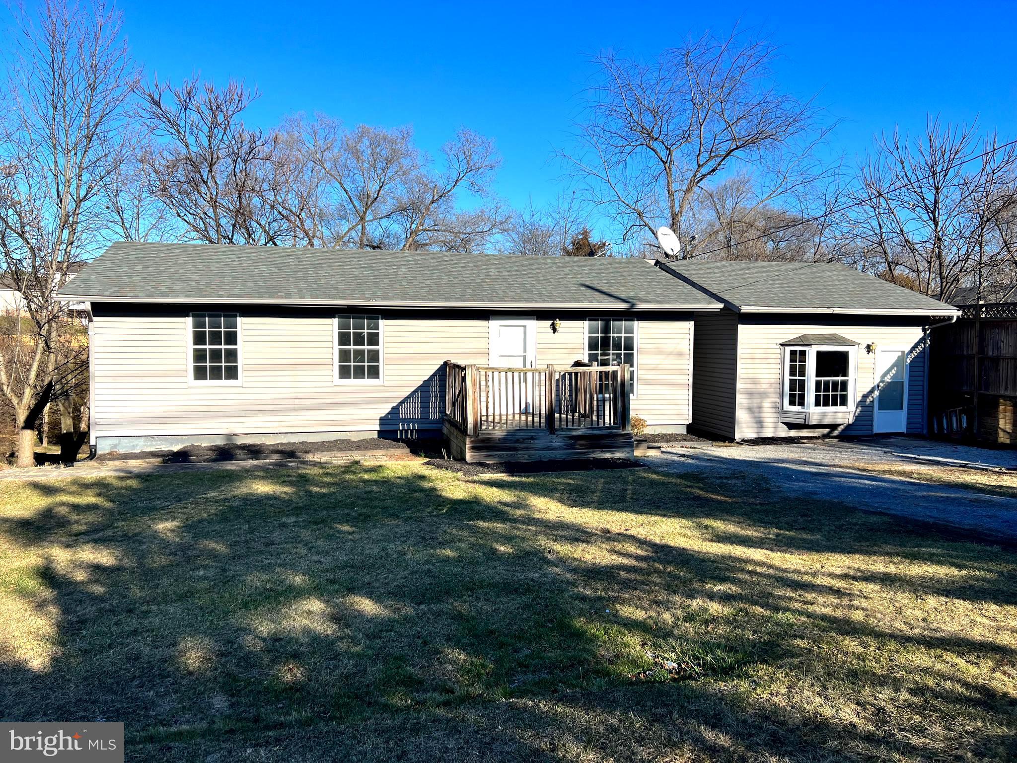 Come quick to check out this beautifully renovated house, it won't last long! A 3 bedroom and 2 1/2 bathroom rancher that sits on .82 acres in a perfect location. This home boosts basically new everything- HVAC system, cabinets, countertops, flooring, and the bathroom in the basement are all brand new! Also it offers a lot of space, from the huge converted garage into another living area to the finished basement, you will never run out of space. This house has everything you would need!