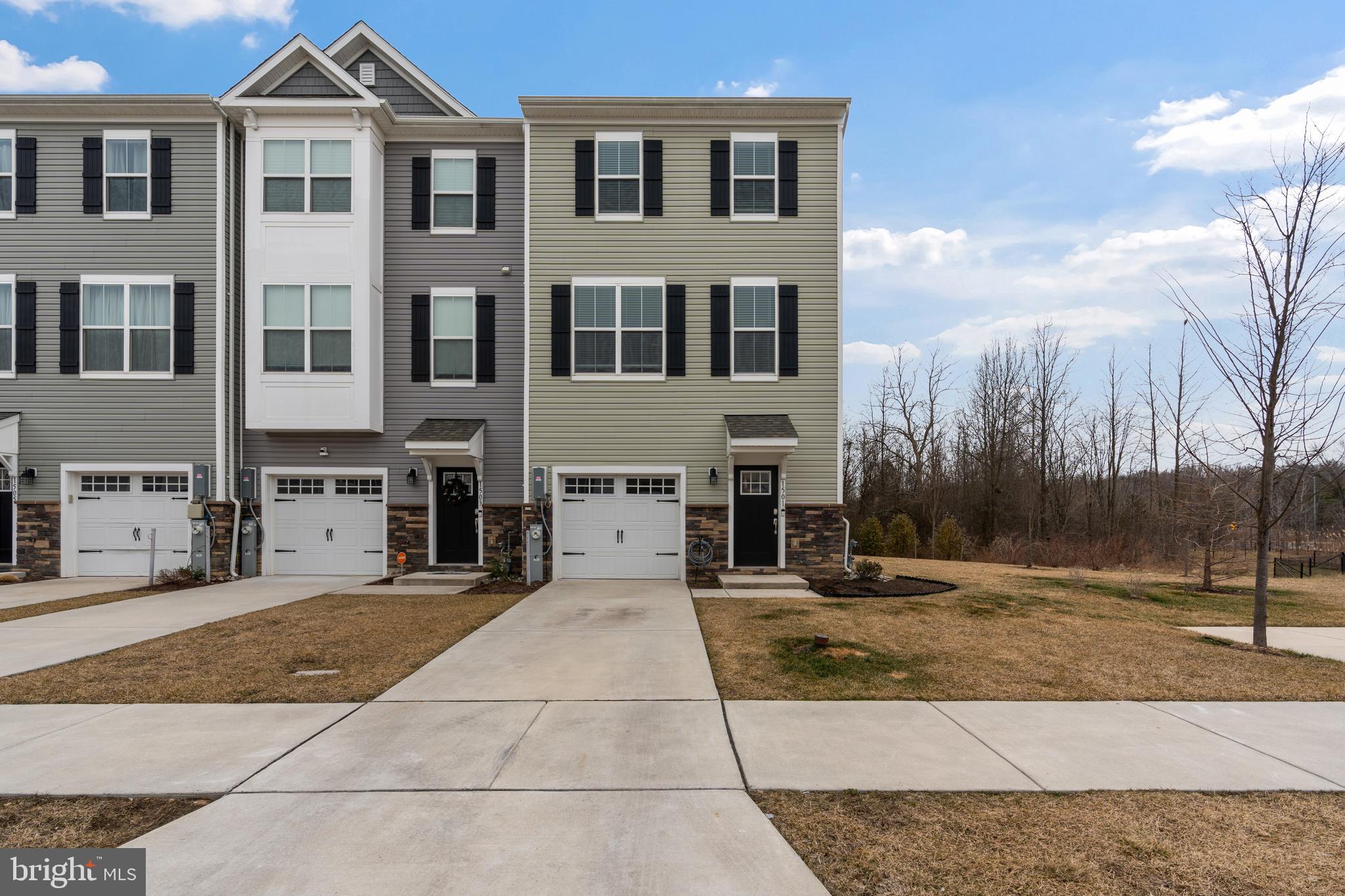 Welcome to 1501 Hudson View Rd, a stunning, nearly-new 4-bedroom, 3.5-bathroom end-unit townhome available for rent in the desirable Hyde Park Overlook community of Essex. Built in 2021 and maintained in pristine condition, this three-story home offers 1,920 square feet of bright, modern living space with the added privacy and abundant natural light that only an end unit can provide. You'll love the everyday convenience of the attached built-in garage, energy-efficient central heating and cooling, and a spacious layout that seamlessly extends to a private back deck perfect for morning coffee or evening relaxing. Located within the Baltimore County Public Schools district and offering easy access to local dining, shopping, and commuter routes, this beautiful rowhome perfectly blends modern comfort with ease of living.