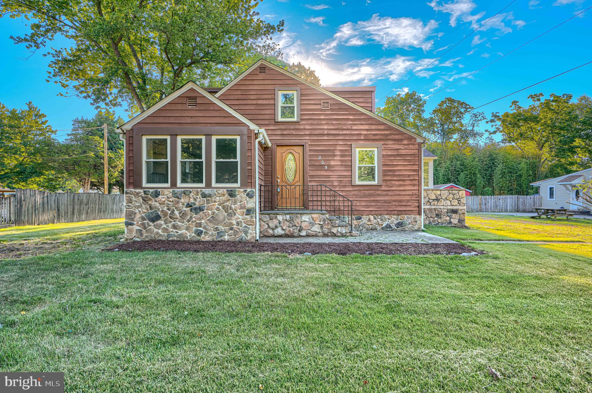 Discover this updated cottage style home that blends classic architecture with modern living, offering 2,783 sq. ft. of versatile space. Venture inside to find a welcoming traditional floor plan with new luxury vinyl plank flooring and fresh interior paint that flows from the living room to dining room and well-appointed bedrooms. The upgraded kitchen, equipped with custom-white cabinetry, stainless-steel appliances and granite countertops, is a perfect place for culinary enthusiasts.  The three bedrooms and full bathroom equipped with a stall shower and whirlpool tub, ensures comfort and relaxation after a long day.  The finished 2nd level with new carpet flooring can be converted or used into a 4th bedroom while the main level sunroom with its bright airy ambience is a perfect spot for entertaining. Outside, enjoy the tranquility of your front and rear yards, great for gardening or outdoor activities. Note -Seller is putting final touches on renovations.