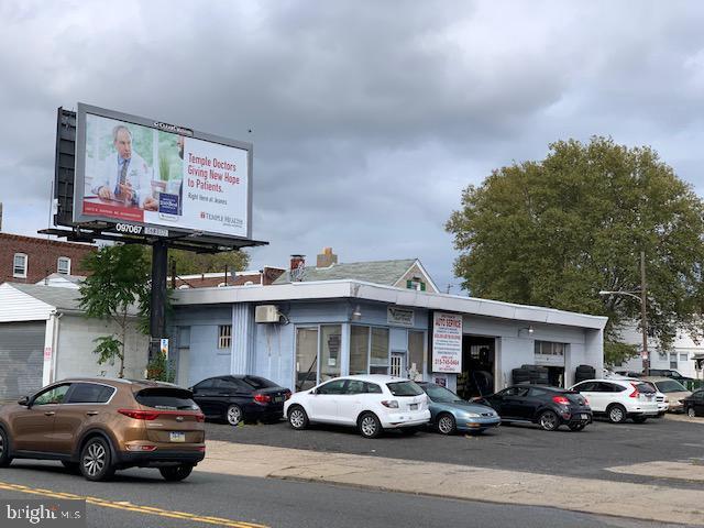 Rare opportunity to own corner property commercial real estate on a busy intersection with maximum exposure.. Property may have many potential uses.  Active Auto repair shop.  Building and business are for sale.  The billboard sign on the property generates $2300 per year additional income. Seller is ready to retire!!!