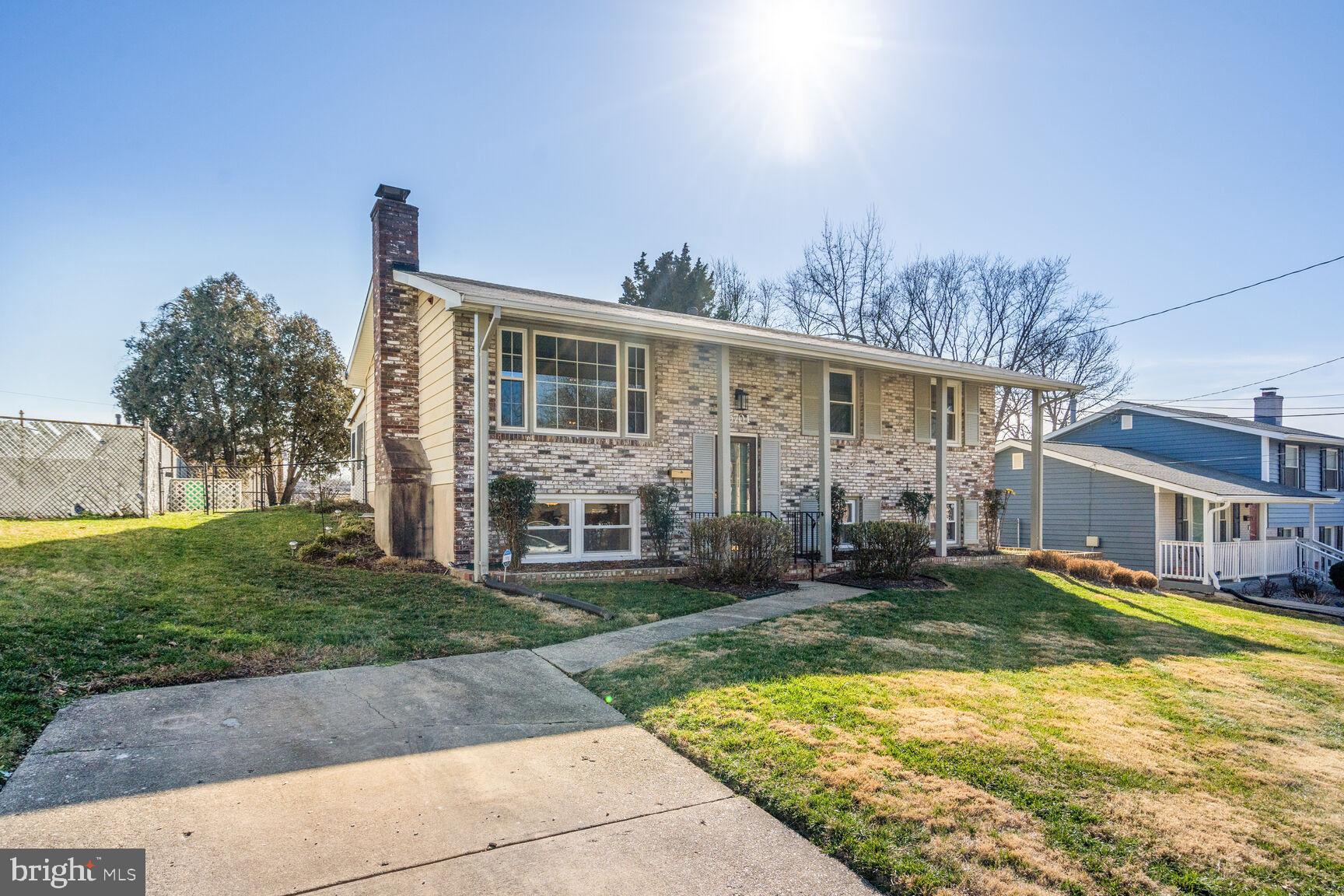 Welcome to This Beautiful Two-Level Home in a Very Convenient  Location (Metrorail less than 1-mile away).  It's suited just right and has been well-maintained.  The charming hardwood floors immediately get your attention and is offered throughout the main level.   This home provides an eat-in kitchen with granite countertops, gas cooking and a great dining room space for friends and family gatherings. The living room boasts a lovely picturesque window that pours in a ton of nature light.  You will feel the comfort of a four-to-five bedroom home here...  spaced and roomy.  Enjoy the lower level that offers an delightful family room with fireplace, ceramic tile floors and lots of storage. There are more great conversations taking place here...  The inviting screened-in porch expands your living pleasure with accessibility from the kitchen and dining room, just relax and unwind - while perhaps sipping some tea! The fenced  backyard has room to play and provides a storage shed. You will appreciate the convenience of being near route 214 - Central Avenue with Public Transportation and the Metro nearby,  just minutes to Washington D.C. 495 Highway, Shopping and more. Seller offering Home Warranty.