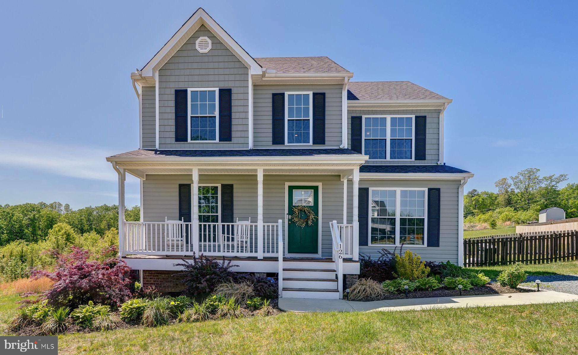 Welcome home to this charming property in Palmyra, VA  that feels welcoming, and easy to settle into. Start your mornings on the covered front porch, perfect for a quiet cup of coffee, a good book, or just enjoying a slow start to the day. Inside, you’re welcomed into an open and inviting floor plan where the kitchen, dining, and living areas all flow seamlessly together. The kitchen offers generous countertop space, stainless steel appliances, and plenty of room for cooking, gathering, and everyday life. The main-level primary suite is a true retreat, featuring a walk-in closet and private bath—ideal for comfort and convenience all on one level. Upstairs, you’ll find three additional bedrooms with clean, well-kept carpeting, along with a full hall bath complete with a tub. A linen closet in the hallway provides additional storage right where it’s needed most. A walk-in laundry room adds to the home’s practicality, and the washer and dryer do convey for added ease. Out back, the spacious deck overlooks a fully fenced-in backyard, perfect for pets, offering both privacy and plenty of room to relax, play, or entertain. Evenings here are especially special, with beautiful sunsets that fill the sky and can be enjoyed right from the back deck. A storage shed adds extra convenience for tools, lawn equipment, or seasonal items. Every detail comes together here to create a home that feels inviting, easy to live in, and just the right amount of special, ready for its next owners to settle in and enjoy .