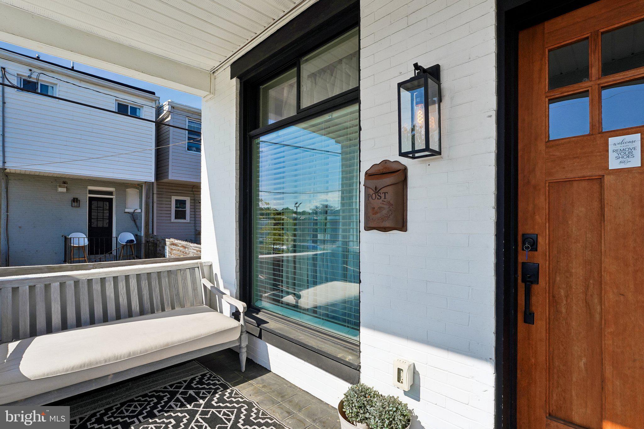 End-of-group. Fully renovated. A rare blend of lifestyle and income potential in the heart of Remington. This 3-bedroom, 3.5-bath rowhome offers 1,040+ sq ft above grade plus a fully finished lower level, designed to live larger, brighter, and more functionally than typical city homes. The sun-filled main level features hardwood floors, an open layout, and a standout kitchen with white cabinetry, granite countertops, stainless steel appliances, and a center island, flowing into a stylish living space anchored by a fireplace and exposed brick that adds warmth and character. The layout naturally extends to a fully staged private patio—complete with seating, lighting, grilling space, and greenery—creating a true indoor-outdoor experience ideal for everyday living or entertaining. Upstairs, three well-sized bedrooms and updated baths with modern tile and fixtures provide comfort and privacy, while the finished lower level offers a second living zone, game room, storage, and rear entry—perfect for guests, flexible living, or separation of space.

Currently operating as a successful Airbnb/short-term rental, the home delivers strong performance at approximately $290/night and around $3,000/month with steady occupancy, and is available fully furnished for a true turnkey setup or can be delivered vacant depending on buyer preference. The combination of 3.5 baths, multiple living areas, dedicated workspace potential, and seamless layout makes it ideal for hosting, house hacking, or primary living with income flexibility. Located minutes from Johns Hopkins, R. House, and the Hampden corridor, with strong walkability to dining and retail, this property offers both immediate livability and proven earning power in one of Baltimore’s most active and desirable neighborhoods. Buyer to verify short-term rental licensing and use.