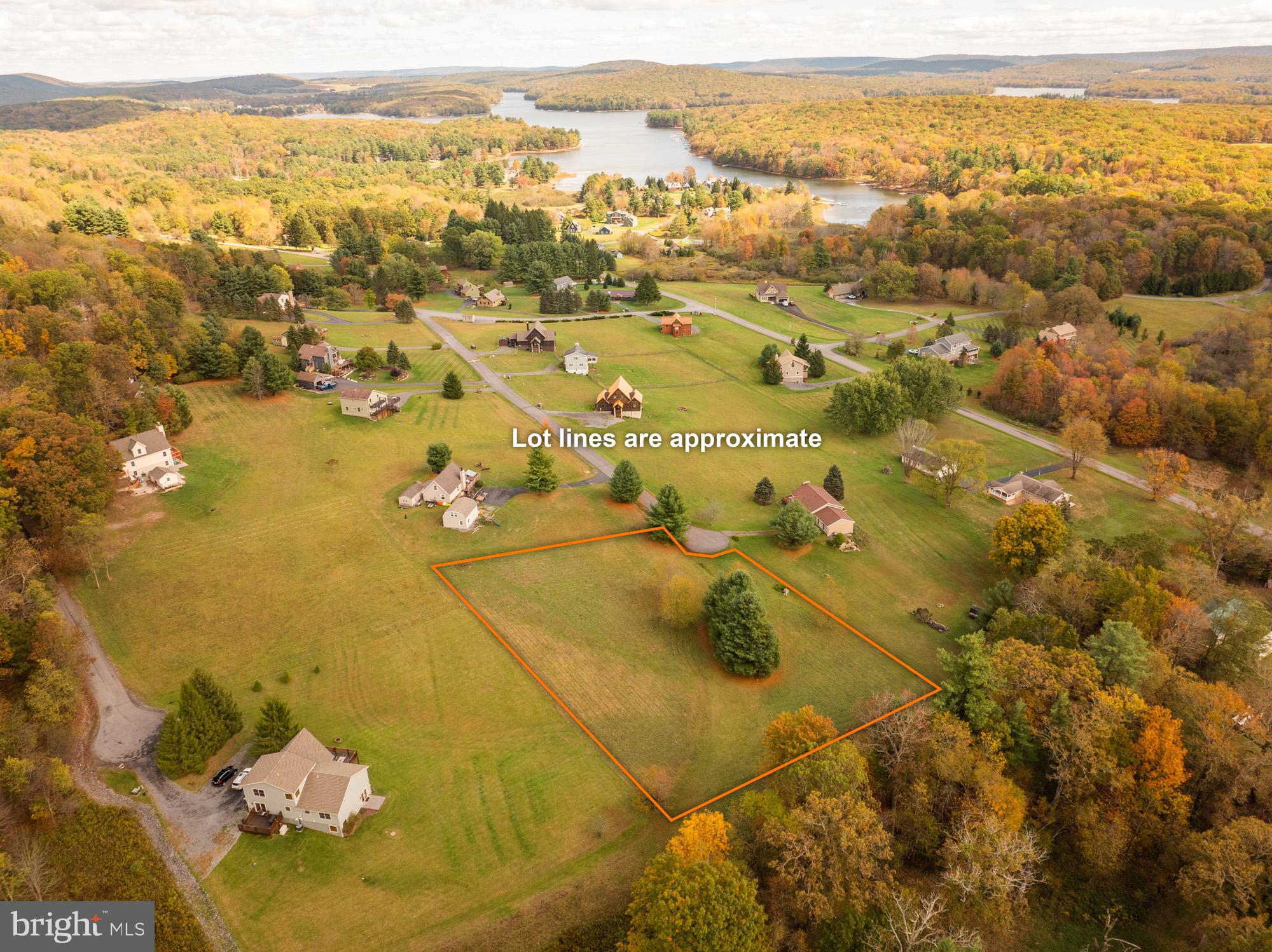 Ready to bring your Deep Creek Lake dream home to life? This beautiful 1.7-acre lot in the sought after community of Paradise Ridge offers the perfect blend of peace, privacy, and lake access. Spend your summer days down by the water, where owners enjoy access to one of the area’s best lakefront spots, complete with a sandy beach, picnic pavilions, and kayak or swimming areas. When the day winds down, head back to your property to take in wide open views and mountain air as you plan your future getaway or year round retreat. With gently rolling land and plenty of space for your ideal layout, this lot is ready for your builder and your imagination. Located just minutes from restaurants, shops, and everything Deep Creek Lake has to offer, it’s a rare opportunity to own a piece of mountain Maryland that’s both peaceful and convenient. Come see it in person. Your Deep Creek Lake story starts here.
