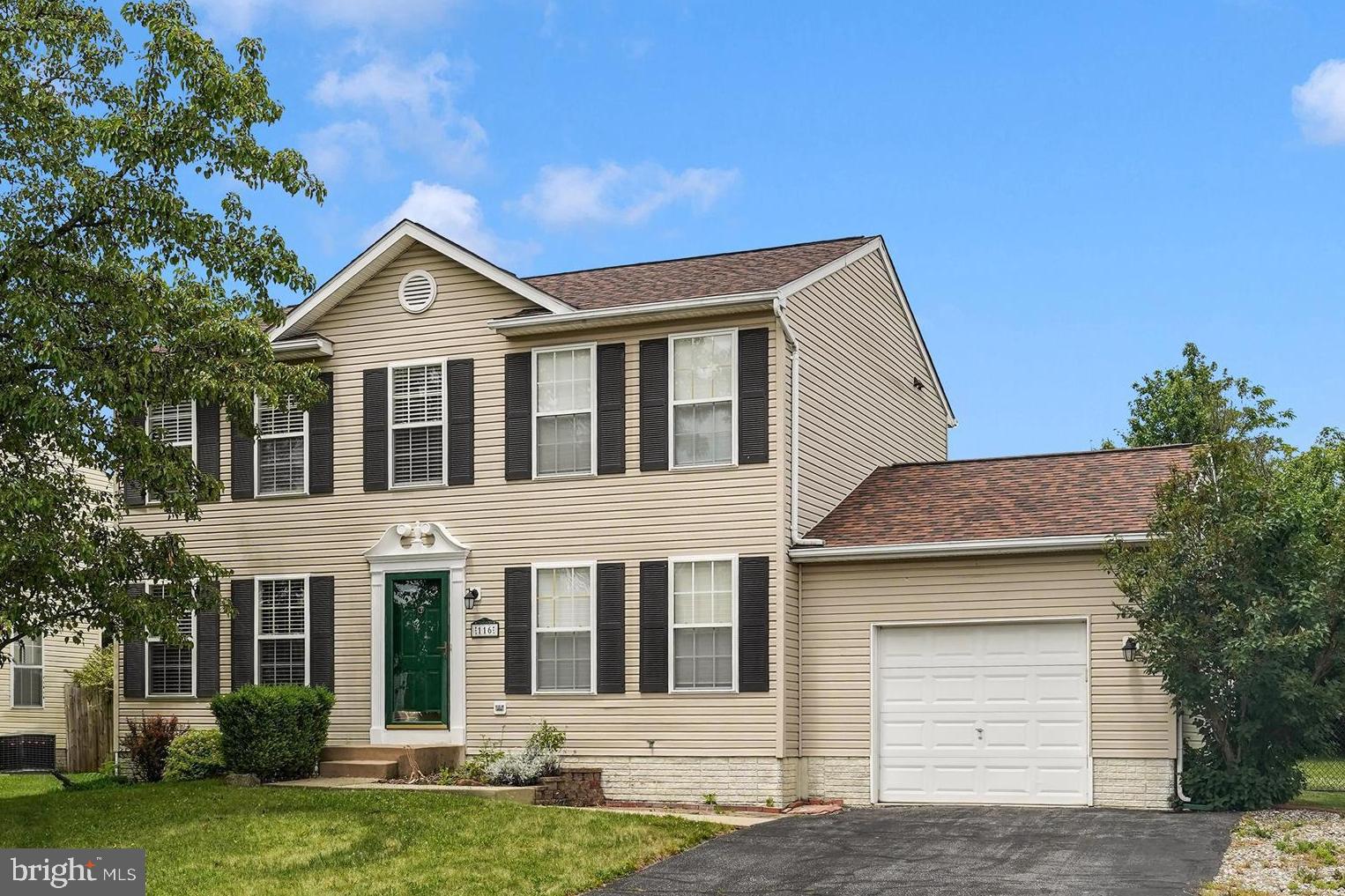 Immaculate colonial with nice curb appeal.  This home has been well-kept and is move in ready.  As you enter the foyer you have a large living room which is the full length of the home.  The kitchen has an eat-in space, half bath and there is also a separate dining room or could be used as a home office on the first level.  This home has fresh paint throughout.  The upstairs has large spacious bedrooms, two full baths, walk-in closets, a skylight in the main bathroom and newly installed carpet.  The basement is ready for your final touches to make it fully finished.  This home has plenty of parking with the one car garage, driveway and also street parking.  The fully fenced backyard is flat and plenty of room for entertaining with the large deck that is off of the kitchen. Close to shopping, library, restaurants and commuter route.