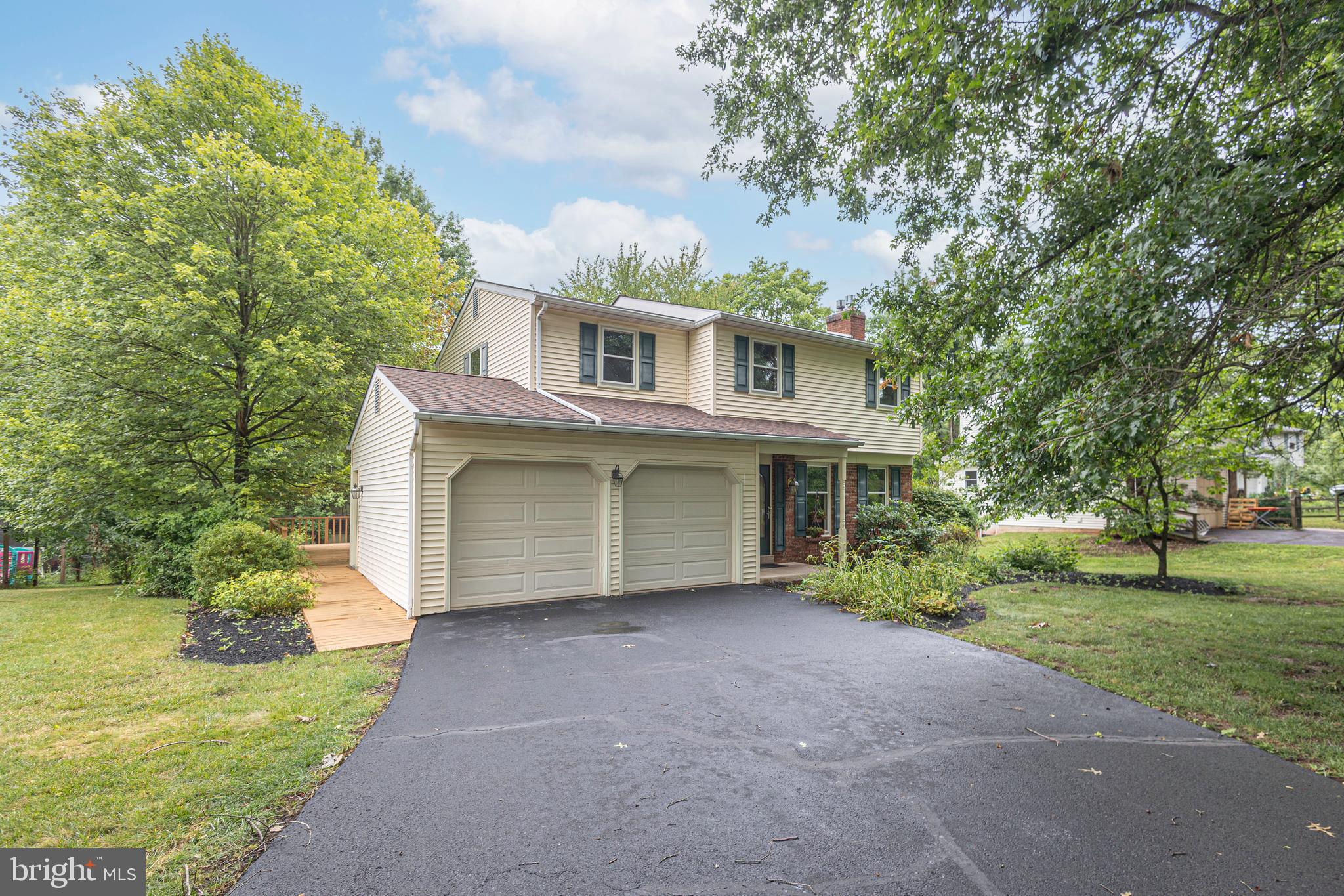 Welcome home to this charming 3-bedroom Colonial nestled in a highly desirable family-friendly neighborhood. This well-maintained home offers a spacious layout featuring a finished basement with a comfortable family room with a propane gas stove—perfect for movie nights, a playroom, or a home office.

Step outside onto the large deck with electric awning, ideal for entertaining, outdoor dining, or simply relaxing while enjoying the peaceful setting. The backyard backs directly to a scenic walking path, providing added privacy and easy access to outdoor recreation.

Additional highlights include a 2-car garage, generous living space, and a location that combines convenience with a welcoming community atmosphere. Whether you're hosting family gatherings or enjoying quiet evenings at home, this property offers the perfect blend of comfort, functionality, and lifestyle.