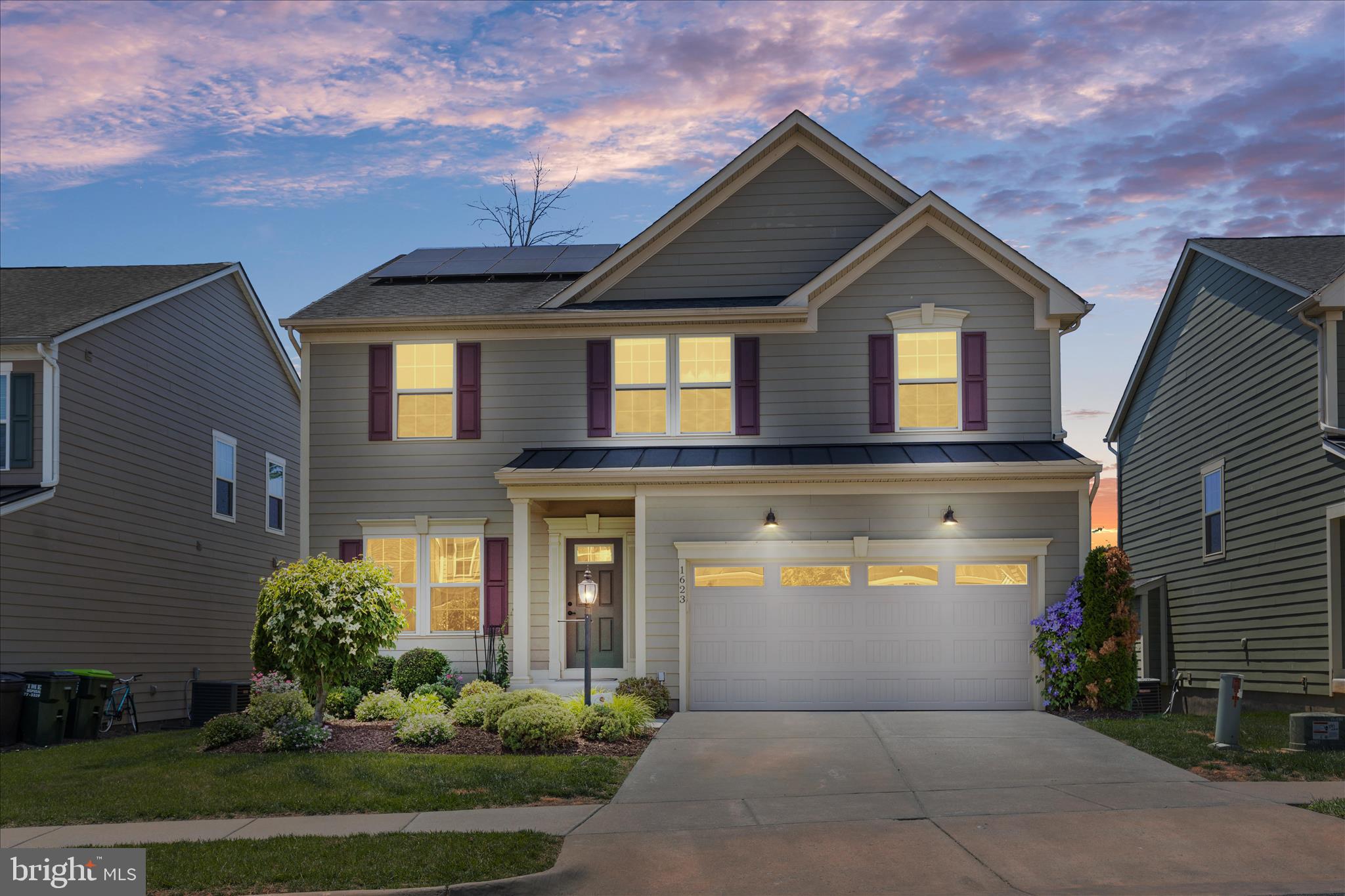 Nestled in the serene Dunlora subdivision, this exquisite Colonial-style residence, built in 2018, offers a harmonious blend of modern luxury and timeless elegance. Spanning over 3,698 square feet, this home is designed for both comfort and sophistication, making it the perfect retreat for those seeking an elevated lifestyle. Step inside to discover a thoughtfully crafted interior that radiates warmth and style. The open floor plan seamlessly connects the family room, adorned with a cozy gas fireplace featuring glass doors, to the gourmet kitchen. Here, culinary enthusiasts will appreciate the upgraded countertops, stainless steel appliances, and a spacious island, perfect for entertaining or casual dining. The formal dining room provides an elegant space for gatherings, while the inviting eat-in kitchen ensures every meal feels special. The home boasts four generously sized bedrooms, including a luxurious primary suite complete with two large walk-in closet and a spa-like bathroom featuring a soaking tub and a walk-in shower. Each bathroom is designed with modern fixtures and finishes, ensuring a tranquil experience. Additional interior highlights include recessed lighting, hardwood floors, and a convenient upper-floor laundry area. Outside, the property is equally impressive. The exterior features a charming deck and patio, ideal for al fresco dining or simply enjoying the peaceful surroundings. The lot, measuring 0.11 acres, backs to lush trees, providing a sense of privacy and tranquility. Located on a quiet cul-de-sac, this home offers a serene escape while still being close to local amenities. The attached two-car garage and private concrete driveway provide ample parking. Energy-efficient windows and appliances further enhance the home's appeal, making it not only luxurious but also environmentally conscious. With its stunning views of the wooded landscape and a commitment to high-end living, this property is more than just a house; it's a place to call home. Experience the perfect blend of comfort, style, and modern convenience in this exceptional and beautiful home.