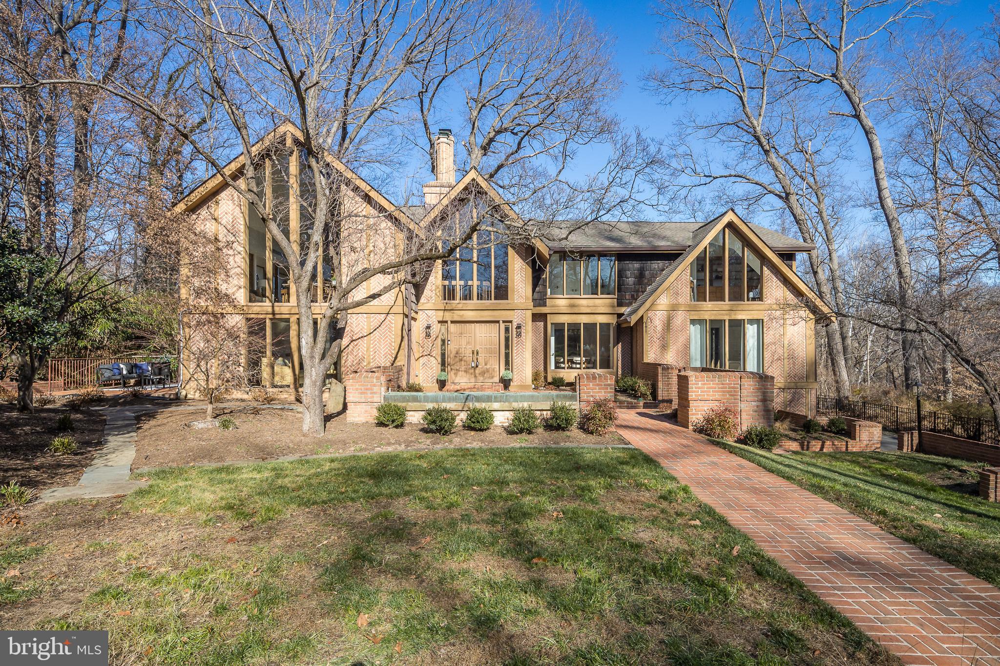 Experience the perfect harmony of nature and architecture in this stunning mid-century contemporary retreat. Nestled on a sprawling 1.97-acre lot backing to the serene Pimmit Run, this home offers a private woodland escape in the heart of McLean.
Inside, the grand living room serves as the home’s centerpiece, featuring dramatic beamed ceilings and walls of glass that invite the outdoors in. This residence has been meticulously refreshed for the buyer, boasting 26 brand-new windows that flood the space with natural light, brand-new appliances, updated bathrooms, a sauna through the primary bath walk-in shower, new paint throughout, roof replaced 01/2024, and all-new light fixtures.
Rarely do you find this much acreage and privacy combined with such sophisticated, move-in-ready design. Welcome home to your private park in McLean.
The property was constructed in 1975 and complies with the construction standards in effect at that time. Recognizing the importance of current egress requirements for today's homeowners, the seller is willing to offer a credit to assist the new owners in upgrading the basement bedroom windows to meet modern safety standards.