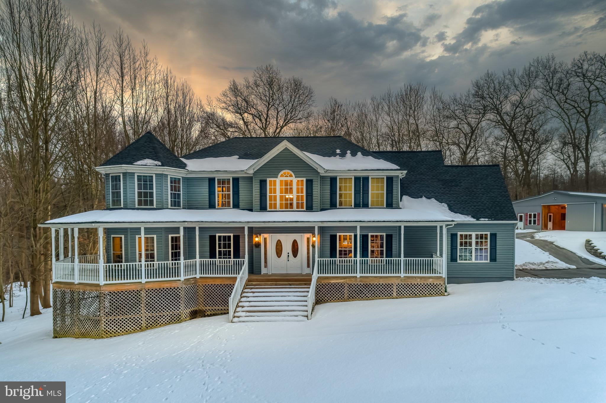 Impossible to find farmette in Parkton with Hereford Schools! Over 4 cleared acres with an immaculate and fully updated home. Roof 2019, new heat pumps, generator for barn and home, 2010 barn/pastures/fencing, 2020 radon fan, siding and new insulation 2010.  Truly worry free.  Wrap-around porch to take in the views.  Ride out directly to the Bee Tree Preserve right from your property and follow the trails to the NCR Trail.  Storm water drainage system was installed in 2011 to make this farm mud free!  Even after heavy rains! Amazing barn with tack room, huge matted stalls, hot and cold wash stall, work shed, compost bin, auto waterers, wood shed, and two large pastures.  The home has a warm family room with a stacked stone fireplace.  Huge kitchen with subzero refrigerator and large island with seating.  Separate dining room for entertaining. First floor dedicated office/study to work from home.  Upstairs laundry room, the ultimate convenience.  Oversized bedrooms.  Gorgeous primary bedroom with sitting area and huge walk in closet.  Separate vanities in the primary bath, standing shower and tub.  2 minute drive to 83. A rare find in today's market.