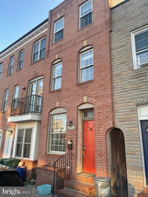 In the heart of Baltimore's Canton neighborhood. This Lovely 3 Bedroom 2.5 Bath row home. Features a private rear fenced patio, The main living room dining room combination greets you with beautiful exposed brick as you enter the home, The kitchen offers new stainless steel appliances, granite counters, hardwood floors throughout, and new paint, Two bedrooms, and a full bath on the second floor; on the third floor you will find a flex space outside the primary suit with a half bathroom and laundry. The primary suite offers a spacious master bedroom and full bath. The rear private patio is a perfect location for private entertaining and BBQ. Walking distance to shops, restaurants, Patterson Park, Brewers Hill, and the waterfront. Easy access to Johns Hopkins, Fells Point, and downtown. ***Don't miss this great Home***