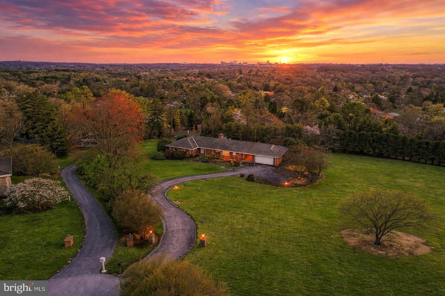 ESSENCE
Live authentically. Brick rancher teeming with potential — quiet perch at the end of the cul-de-sac. At dusk, the Towson skyline ignites beyond the tree line. Stamp your aesthetic. Fieldstone fireplaces rise floor to ceiling, anchoring light-filled rooms with a sense of permanence. The breezeway opens to a second-floor balcony; the finished lower level offers beamed ceilings and a full wet bar. Outside, a glimmering pool makes summer worthwhile. The canvas is yours to paint. New deck, gutter, downspouts and fascia installed in 2025. Cultivate your existence. The art of uniting human and home.

LOCAL FLAVOR AND PROVISIONS
John Brown Store, Graul's Market, and Wegmans. Favorite local dining at The Milton Inn, The Oregon Grill, The Valley Inn, Peerce's, The Butler Cabin, and The Filling Station. An exit north offers dining at Casa Mia’s, Manor Tavern, The Fill'Er-Up, Woodfire Kitchen and The Creamery Connection. Tap into local breweries, such as Inverness Brewing, Farmacy Brewing and Big Truck Farm Brewery.

OUTINGS AND LEISURES
If you love the outdoors, Oregon Ridge Park is perfect for hiking and picnics. Plus, the park provides a beautiful fishing lake. The park also hosts events and concerts during the summer. Loch Raven Reservoir offers scenic beauty and water activities. Explore the NCR Trail. A 21-mile flat, crushed-stone trail open to hikers, bikers, and horses, it runs along the scenic Gunpowder Falls river. Go tubing on the Gunpowder River. Enjoy Ladew Topiary Gardens... these gardens are 22 acres of spectacular, award-winning gardens, more than 100 remarkable topiaries, a mile-long Nature Walk, and native Butterfly House. Explore The Manor Mill, a pre-revolutionary grist mill that now houses a wide variety of art and entertainment events. Tee off at Fox Hollow Golf Course, Pine Ridge Golf Course, Hunt Valley Country Club or Hayfields Country Club. Visit The National Lacrosse Hall of Fame and Museum which honors the history and legends in the sport. 

PROXIMITY
Zippy access to the I-83 on ramp, about 14 minutes to Hunt Valley, and about 12 minutes to Towson. Approximately 41 minutes to BWI and 21 minutes to Penn Station.

REGION
Lutherville, Timonium is the site of the Maryland State Fair, a 12-day festival with over 140 years of history. There are rides, livestock shows, concerts and horse races.