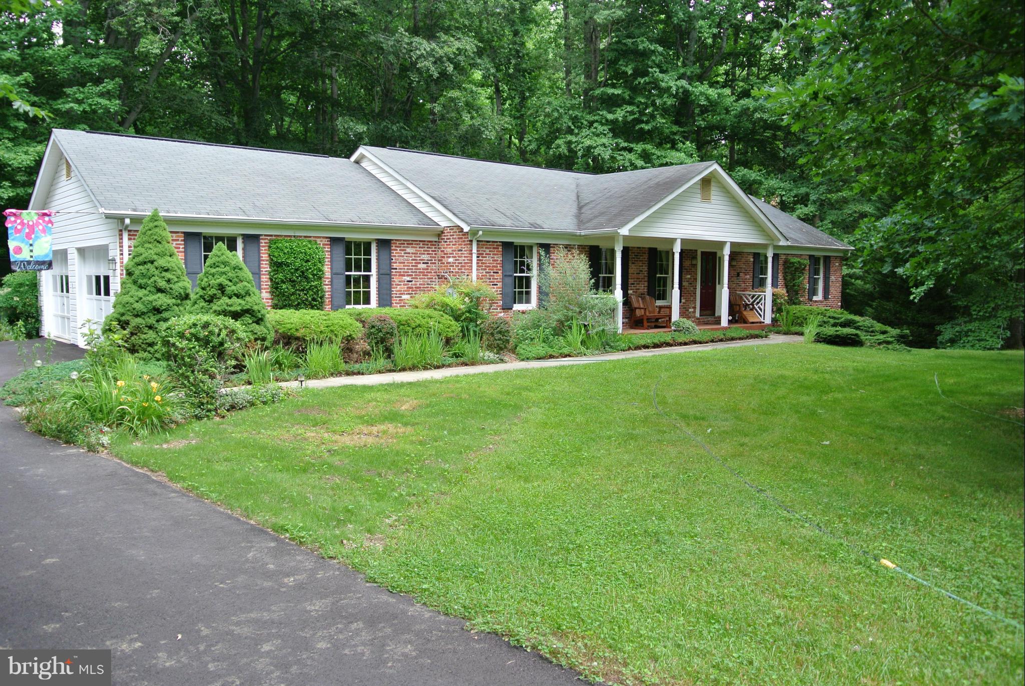 Charming Rambler on over 2 acres.  Huge Deck.  Open Floor Plan.  Lots of Space.  Great location for commuters.  Move In Ready.  Tastefully Decorated.  Close to Shopping and Schools.  Eligible for 100% USDA Rural Development Financing.