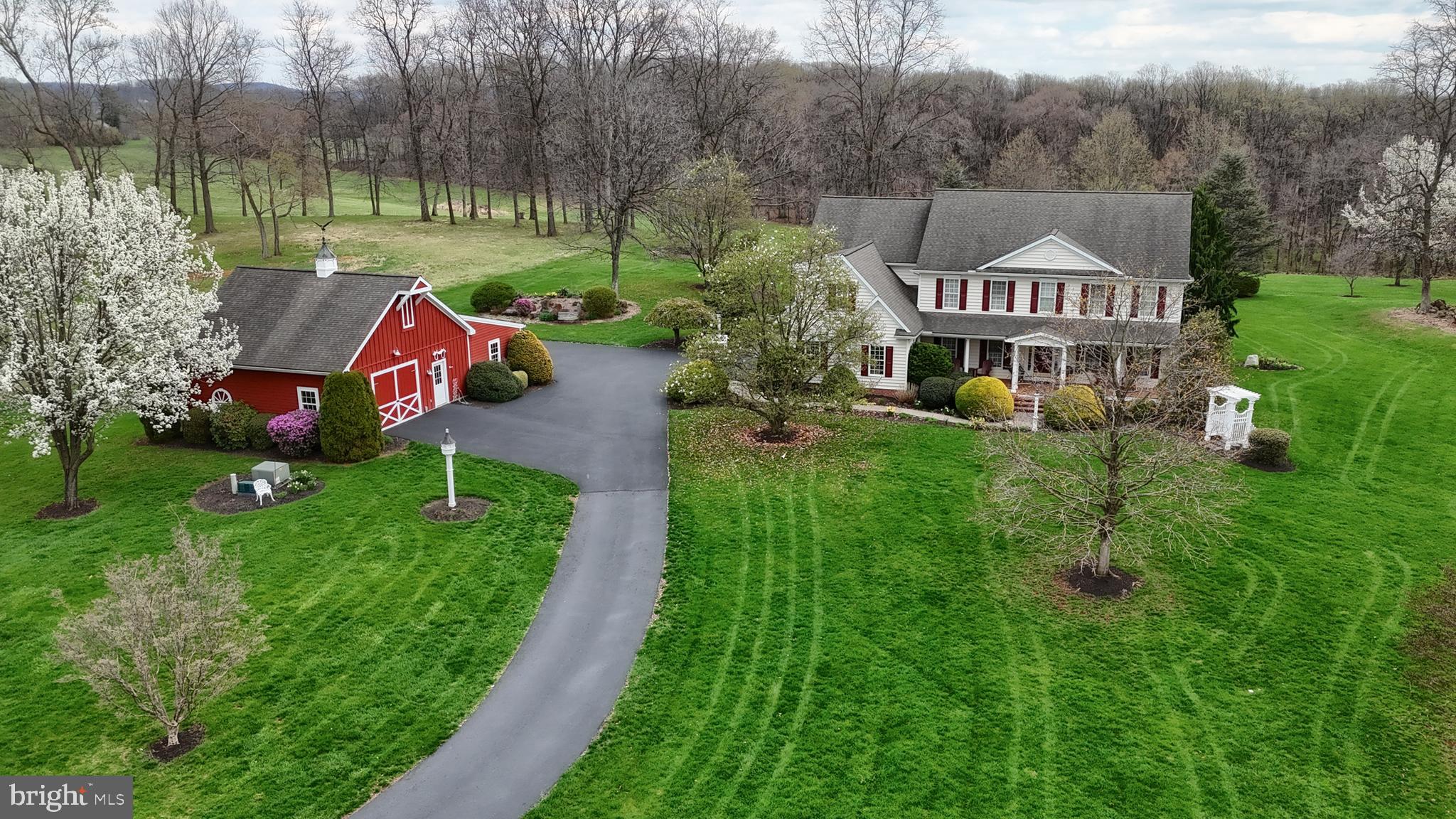 In anticipation of receiving offers, seller would like to set a tentative deadline for offers of Tuesday April 21st at 12 noon with a decision that evening. Once an offer is in hand an email will be sent through showing time to confirm.
 Welcome to your own secluded retreat on 10 breathtaking acres of professionally manicured grounds—so stunning, you’ll feel like you’re strolling through Longwood Gardens.
This custom-built home offers 4 spacious bedrooms and 3.5 baths while boasting a first floor bedroom with full bath on the main level and a Primary bedroom ensuite on the 2nd level, thoughtfully designed for both comfort and elegance.  Enjoy an impressive array of features including all hardwood and tile flooring, a spacious formal dining room with tray ceiling, formal living room with gas fireplace, an impressive 2 story great room with gas fireplace, exuding an abundance of natural light. Two conveniently located staircases with one welcoming you as you enter the front door and the other accessed from the kitchen leading to a dedicated office with built ins. The beautiful conservatory that brings the outdoors in,  boasts Italian tile flooring,  remote blinds, it's own dedicated heating zone, and might become your favorite place to relax. Other features include front and rear covered porches with composite decking, a maintenance free gazebo, 5 garage spaces, a heated worksop with 2nd floor storage, superior wall foundation, 4 zone propane heating and cooling system, Meticulously maintained, this home boasts updated and professionally serviced mechanical systems, giving you peace of mind and true move-in readiness. 
If you’ve been searching for privacy, luxury, and unmatched natural beauty—this is it.

Information though believed accurate is not guaranteed.